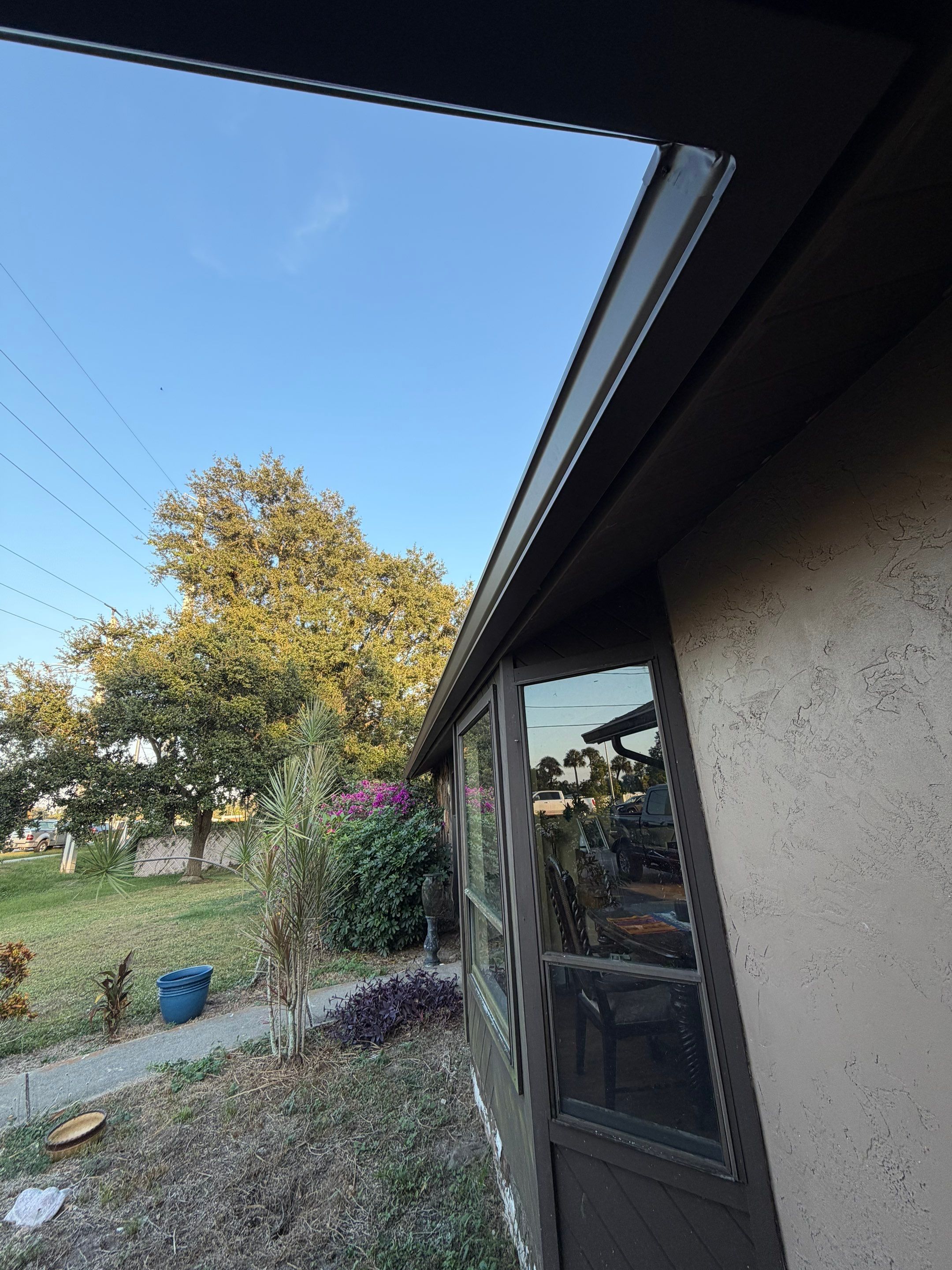 Brown Seamless Gutters for Beach Cottages in Sarasota FL by Gutter Professors