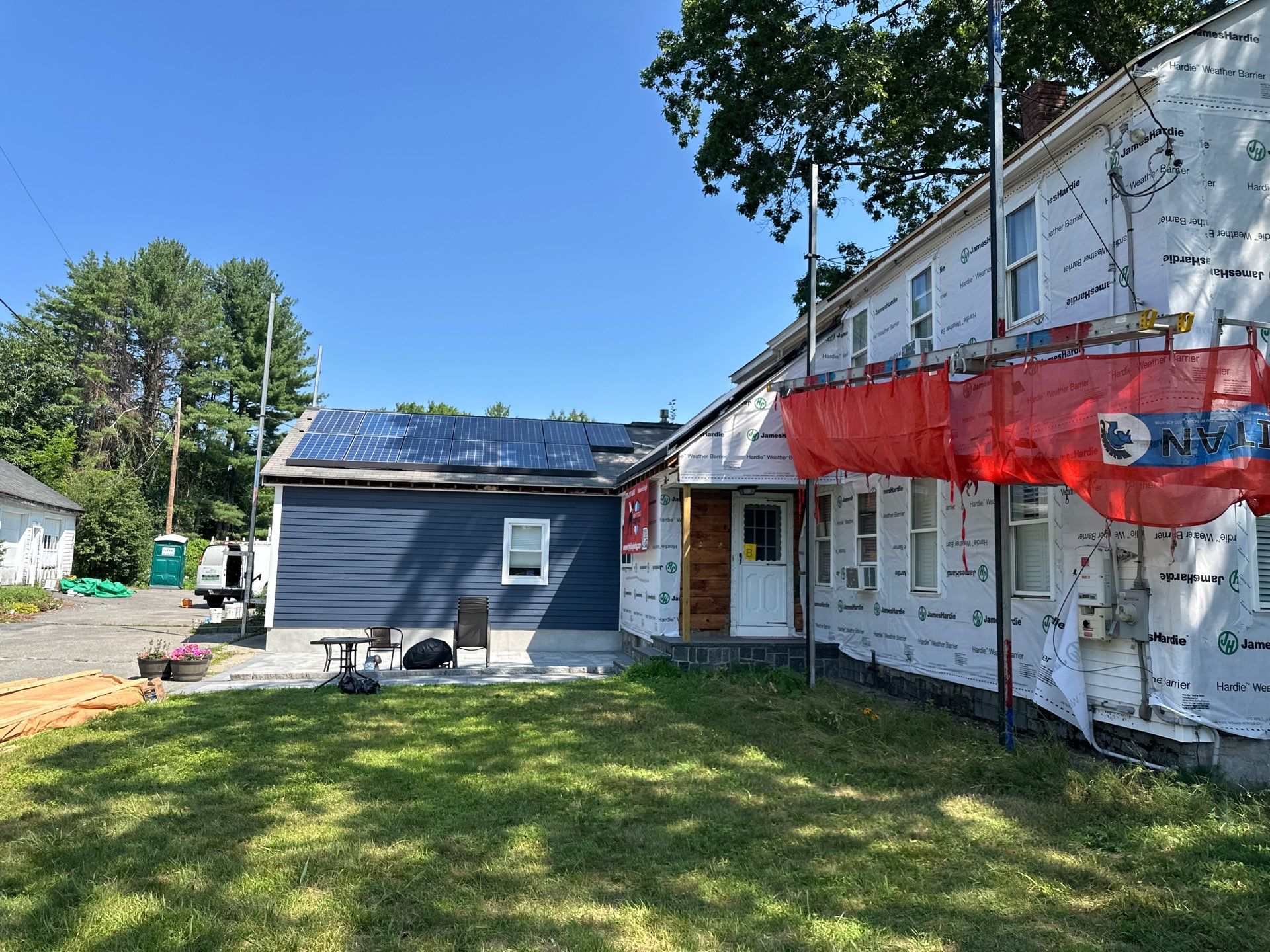 James Hardie Lap Siding Installation in Chelmsford, MA by Mighty Dog Roofing of Greater Middlesex County