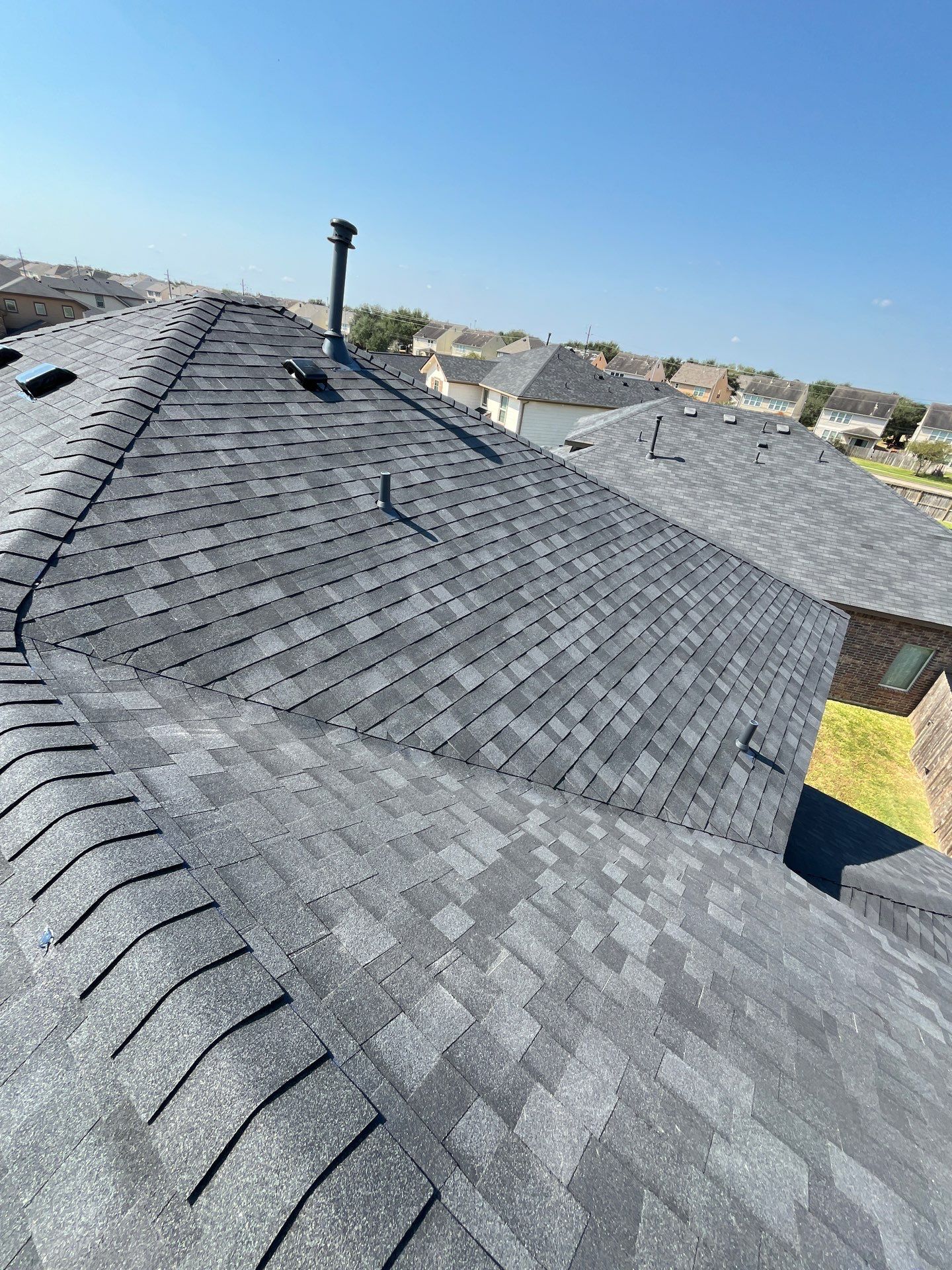 Reroof after Hurricane Beryl by Berry Good Roofing 
