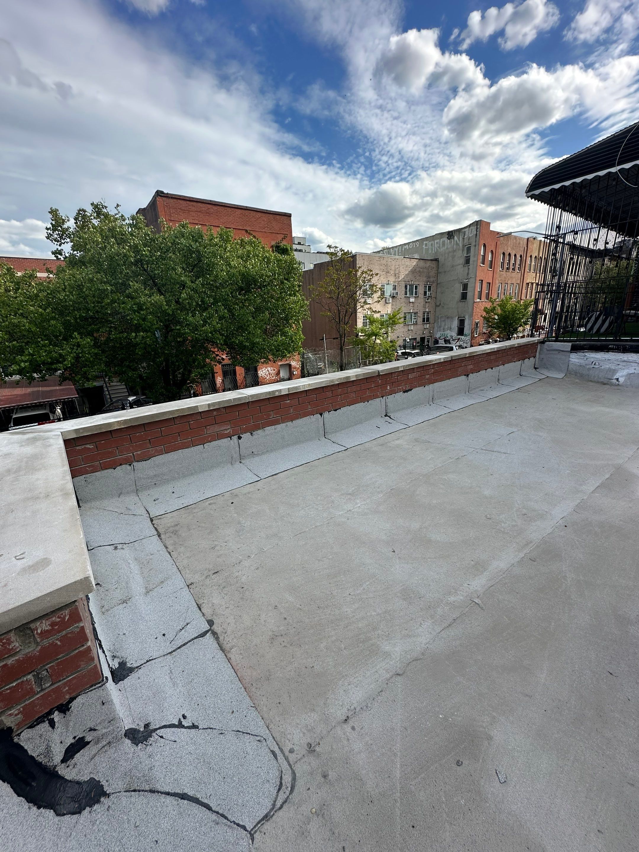 Parapet Rehabilitation  by Medina Design & Development Group