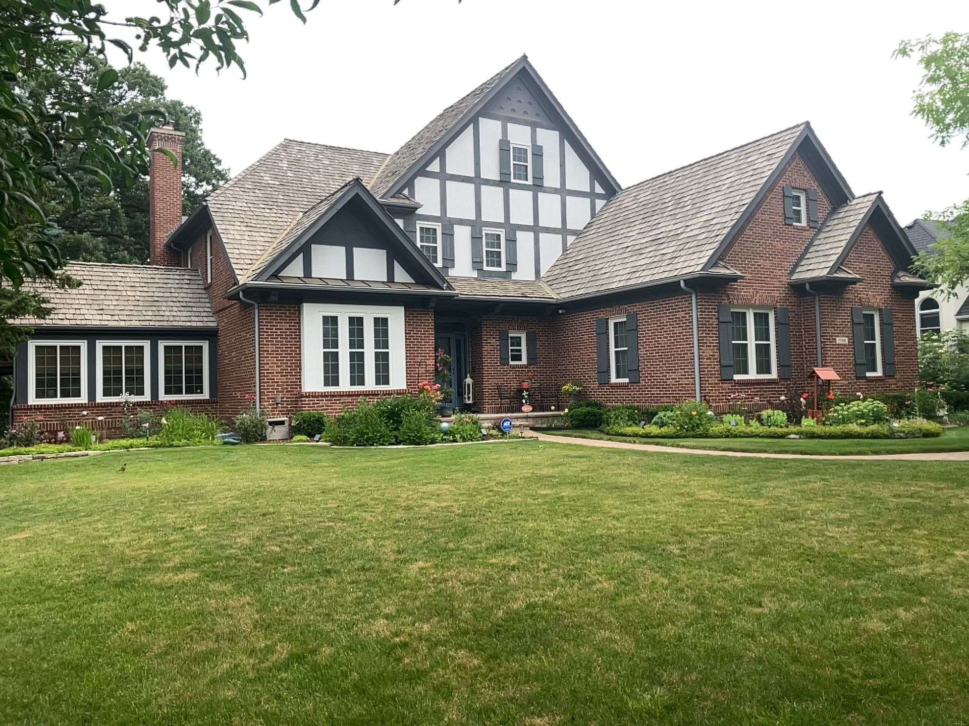 Asphalt Roof Replacement by Custom Installations