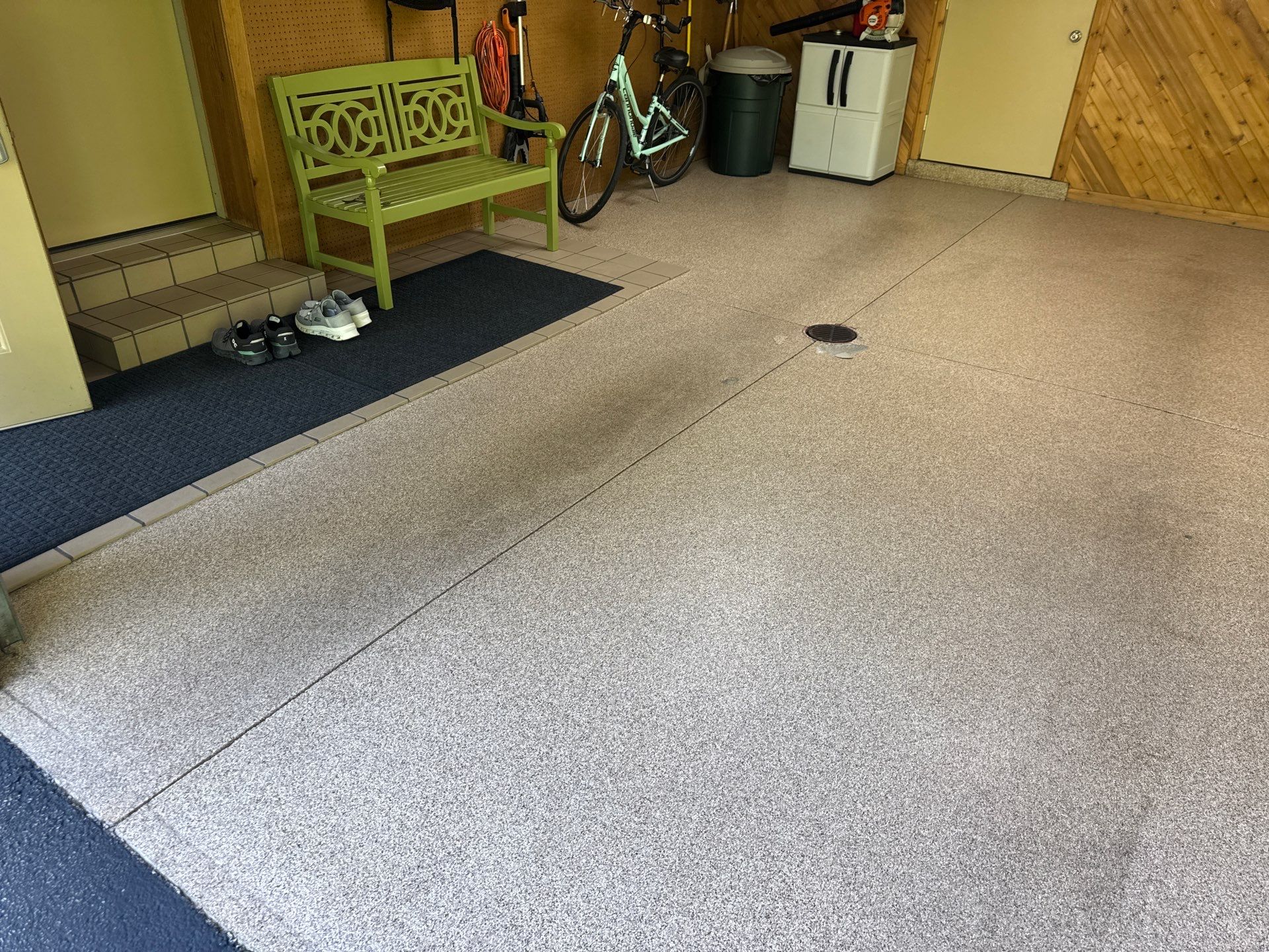 Grand Haven Garage Epoxy Floor Coating with Wax Wing Flake by Gordon Painting