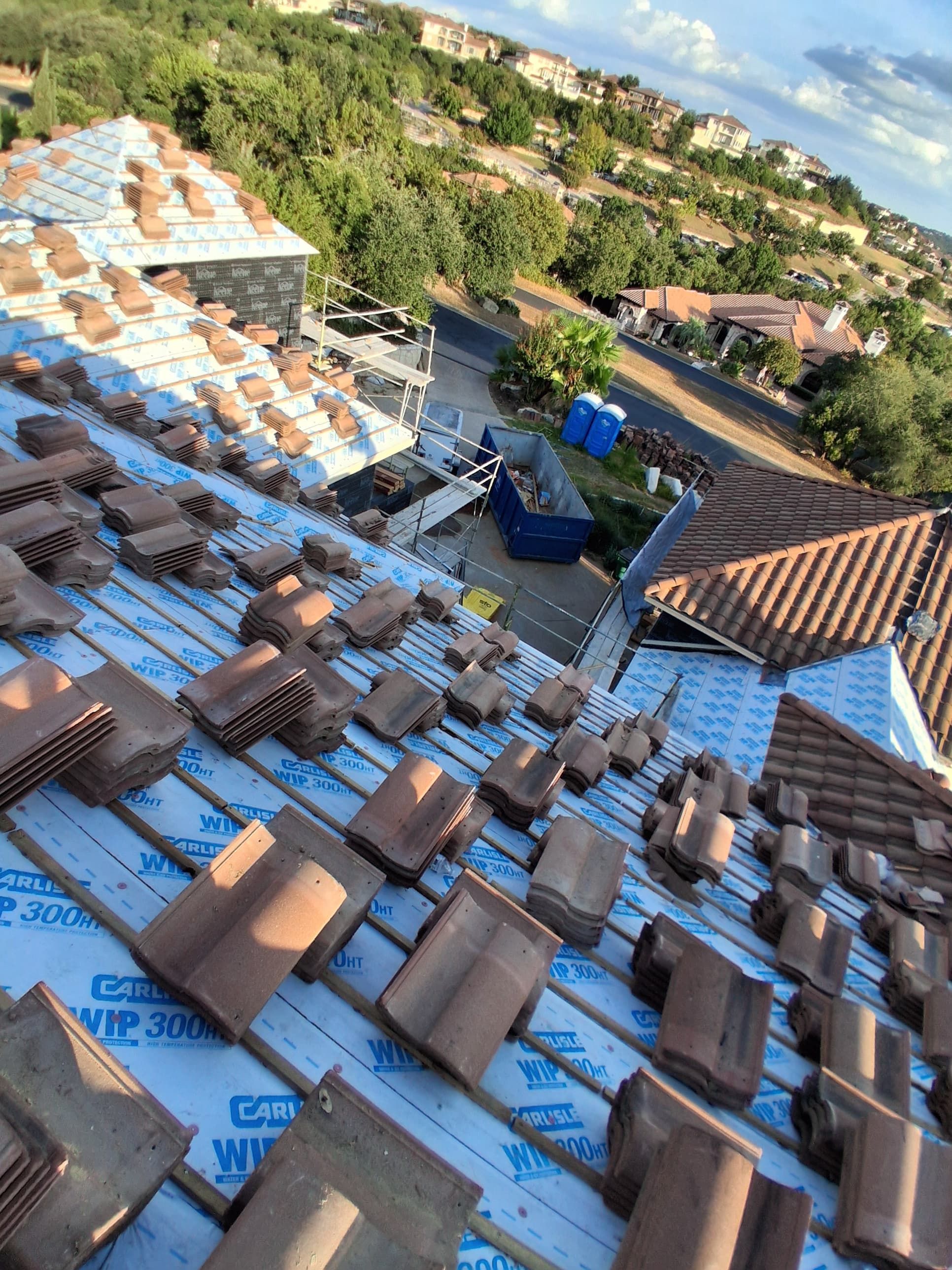 Remodel with new tile roof by REPS Austin Area Roofer