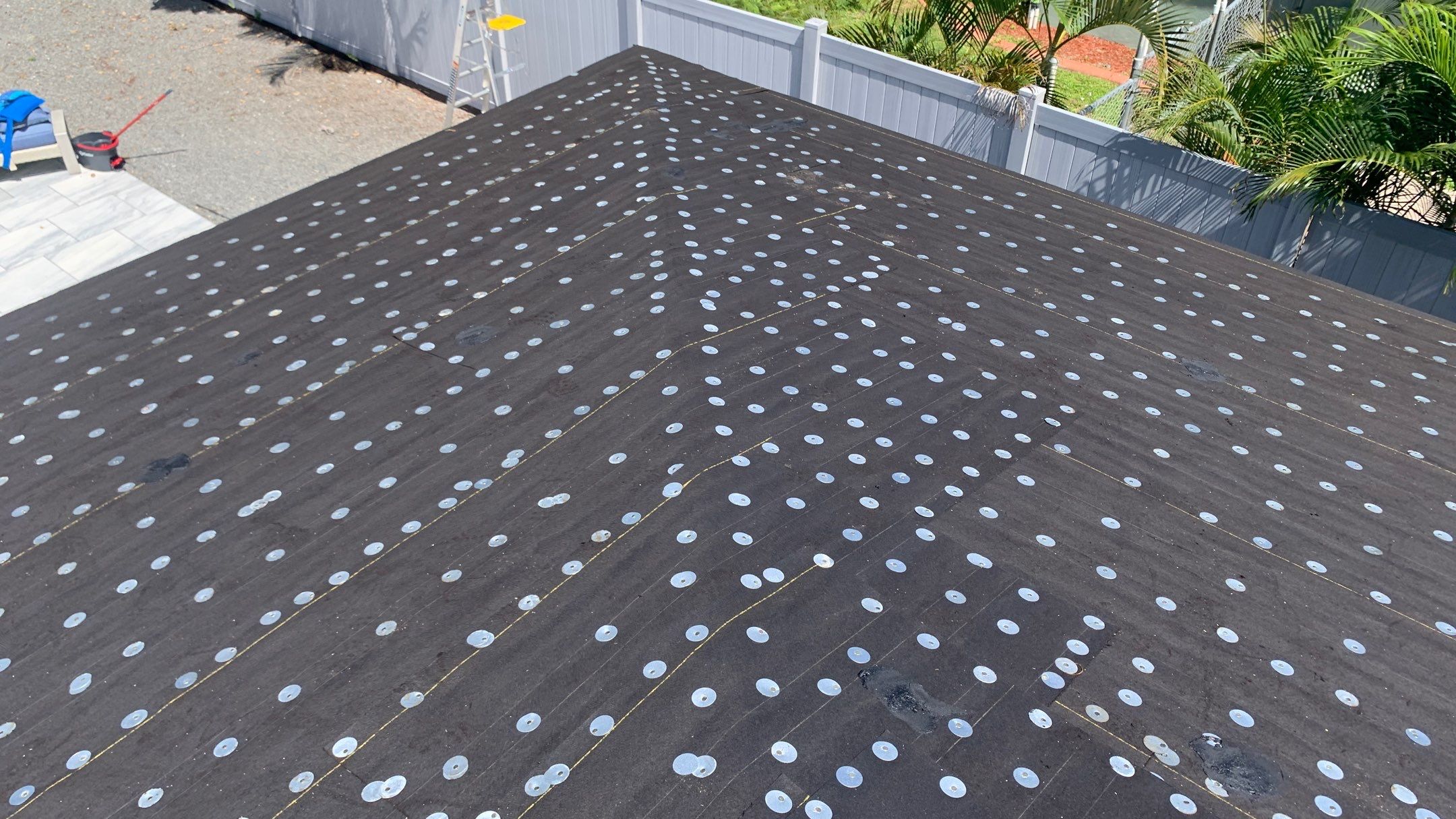 Residential Roofing Installation using 1" Nail strip metal roof by BLUES BROTHERS ROOFING