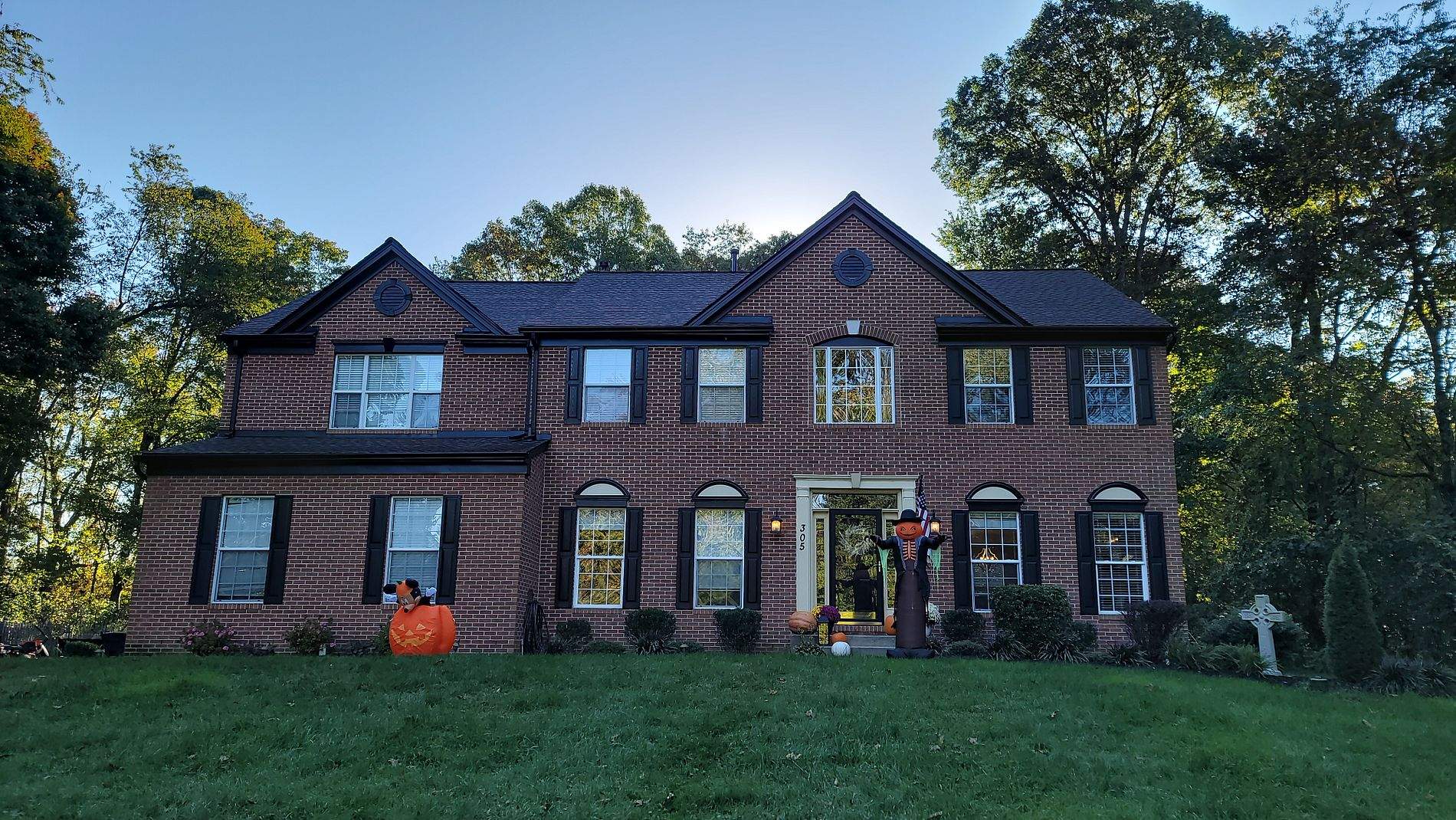 Gutter Installation using Black Gutters, soffit & fascia by Roof Right Inc