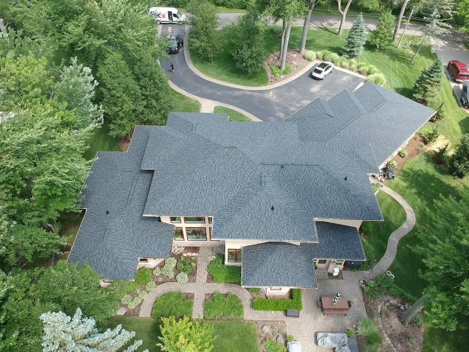 Large Lakeside Roof Replacement by Bloomfield Construction & Restoration