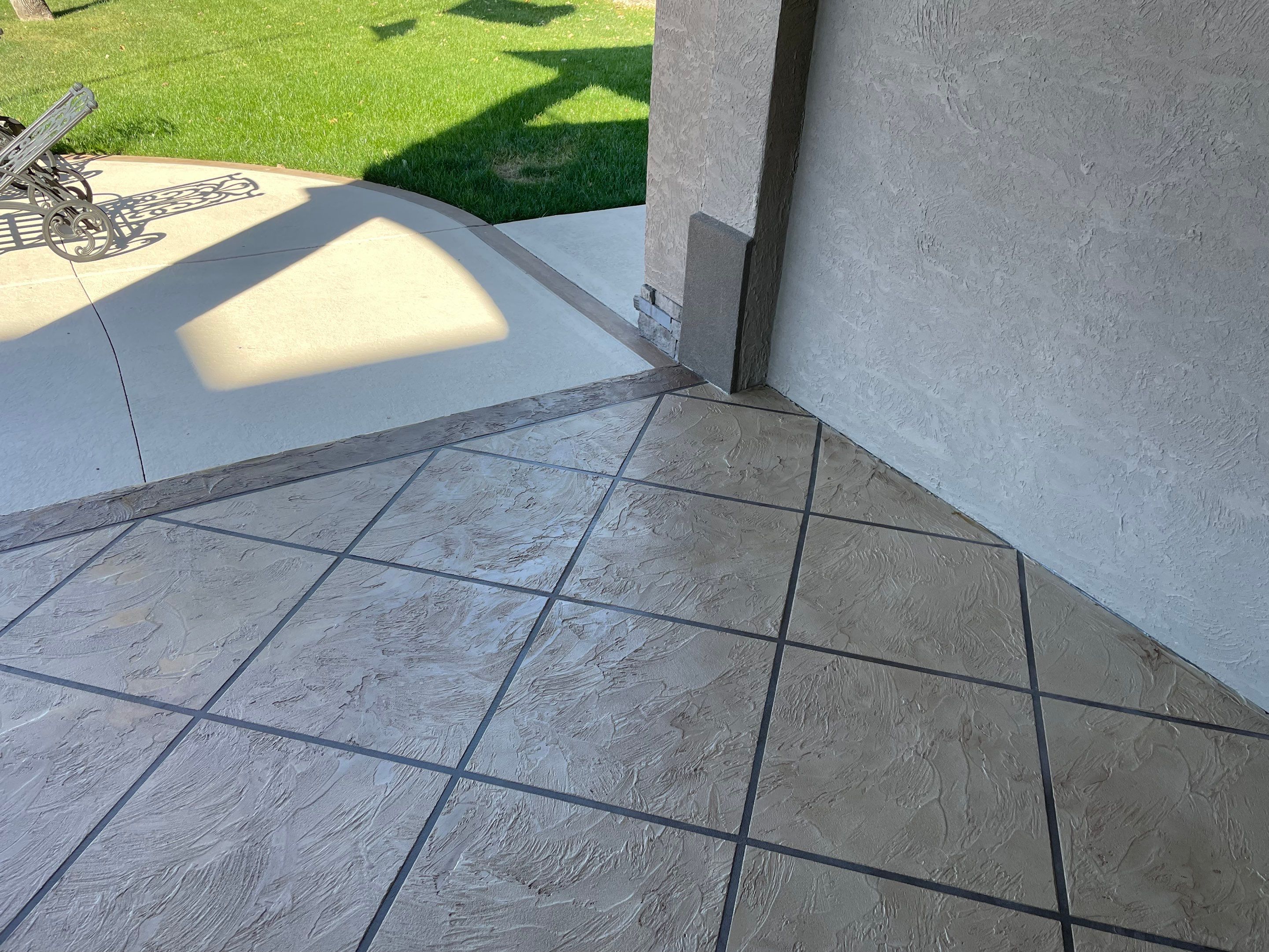 Lake Lotawana -- Front Walkway and Back Patio Tuscan Overlay by Big Red Decorative Concrete, LLC