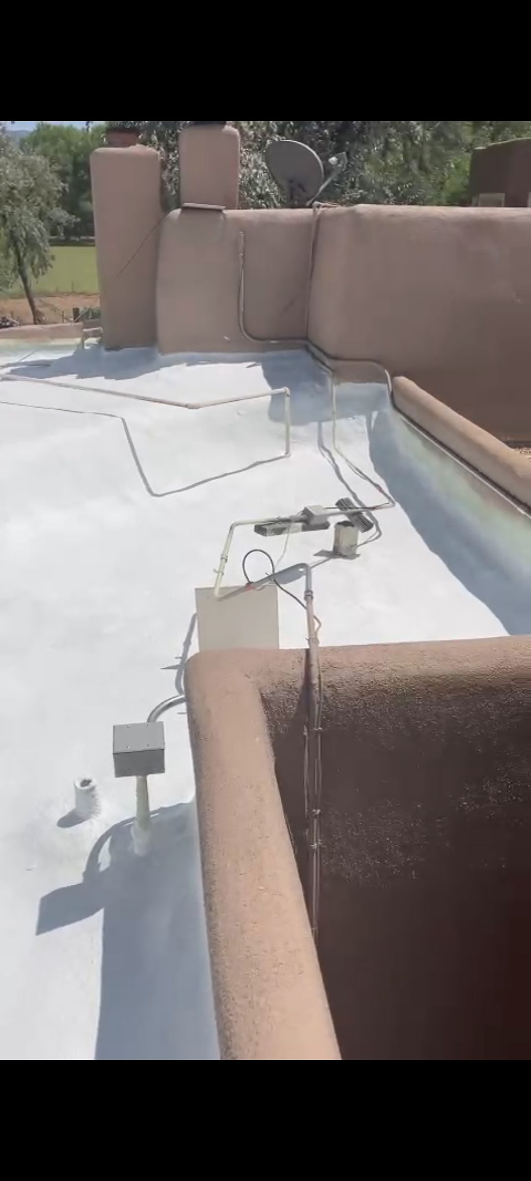 Residential roof application by SPF Services 