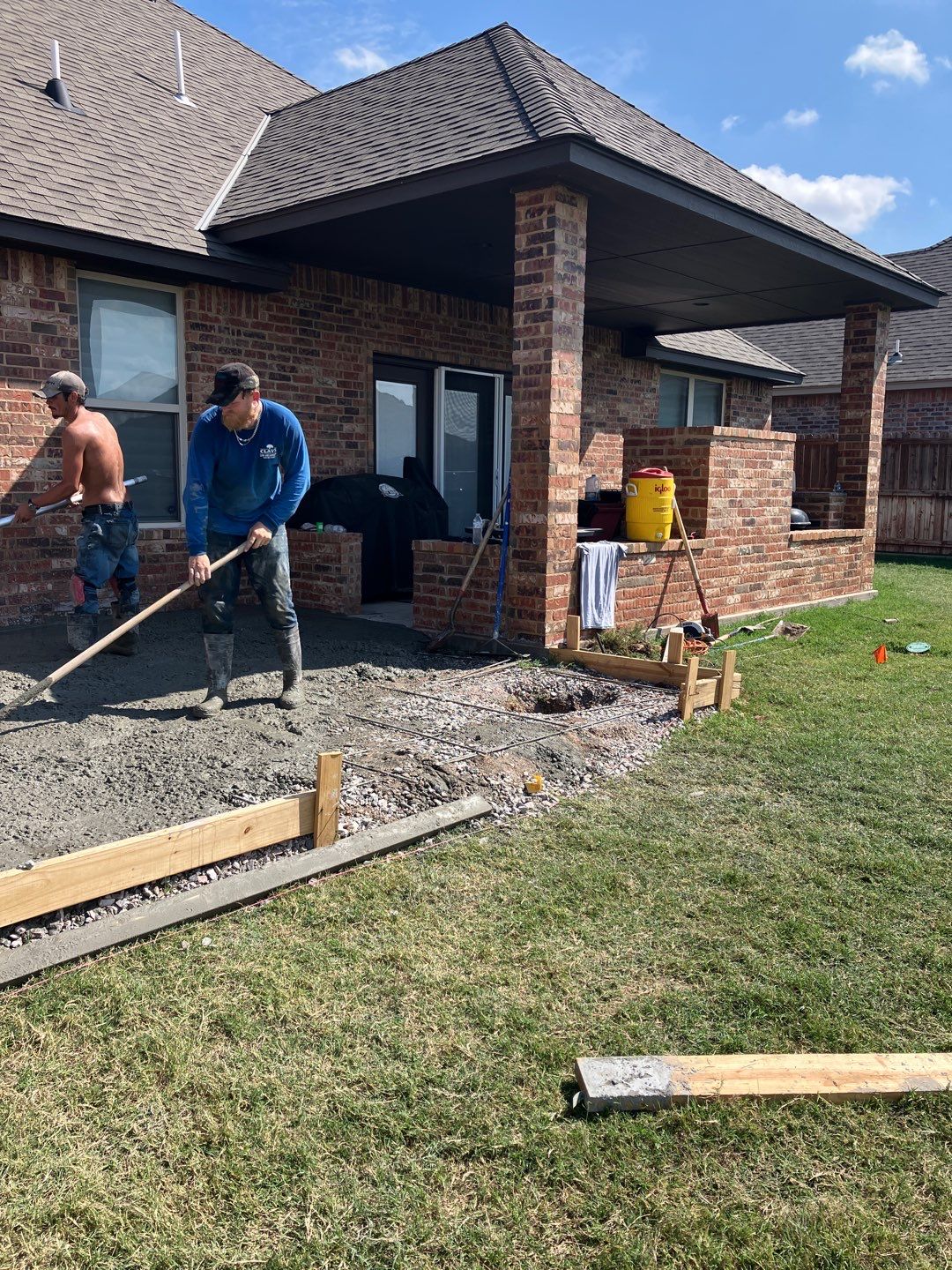 Concrete slab with Pergola by Clays Services Inc