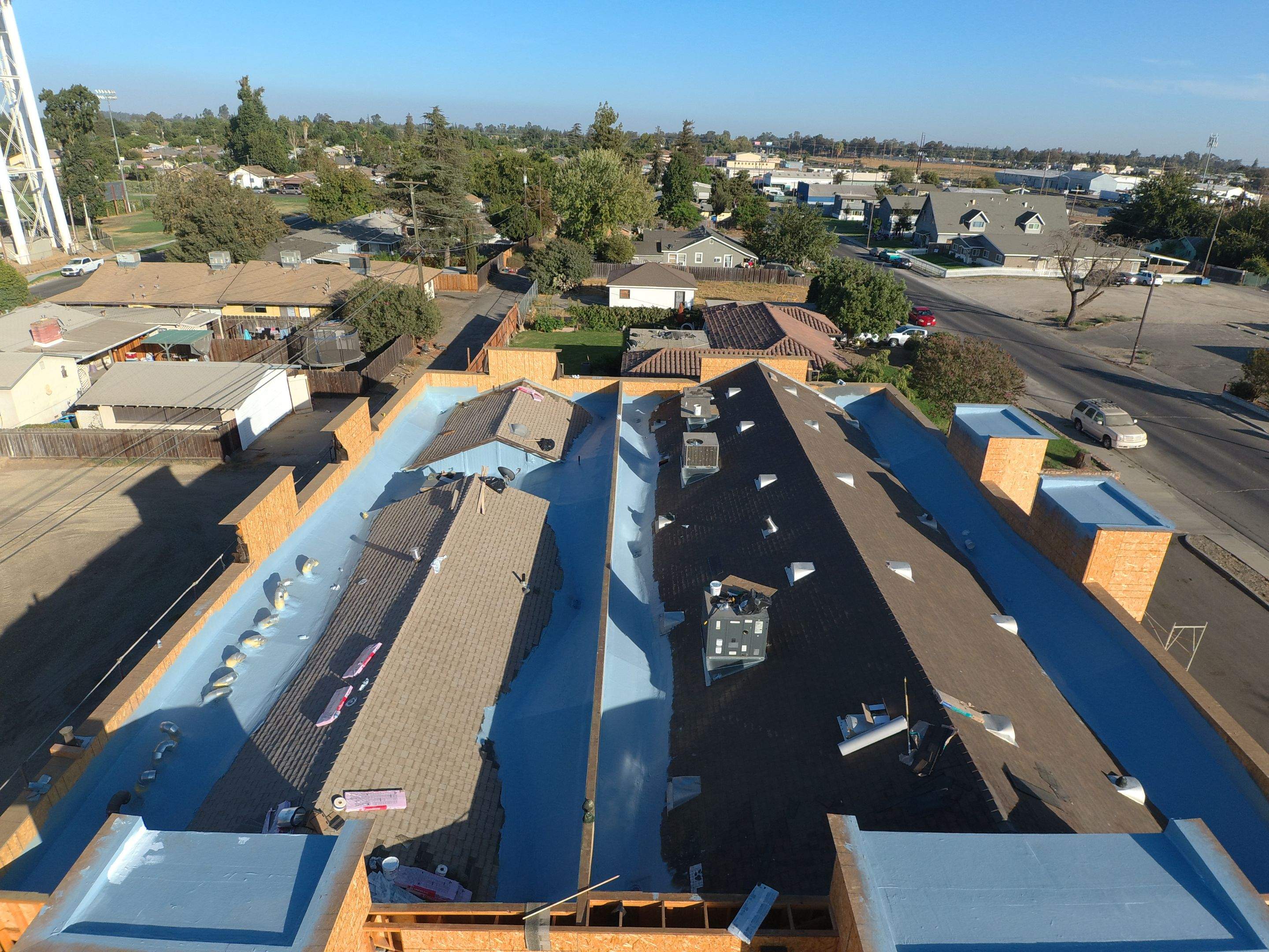 Spray foam and coatings using Conklin Benchmark/PUMA XL coatings and spray foam by Straight Edge Roofing Inc