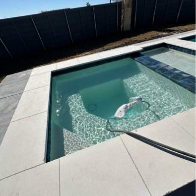 Geometric Pool with Raised Spa and Tanning Ledge by Pinnacle Pools and Spas - DFW