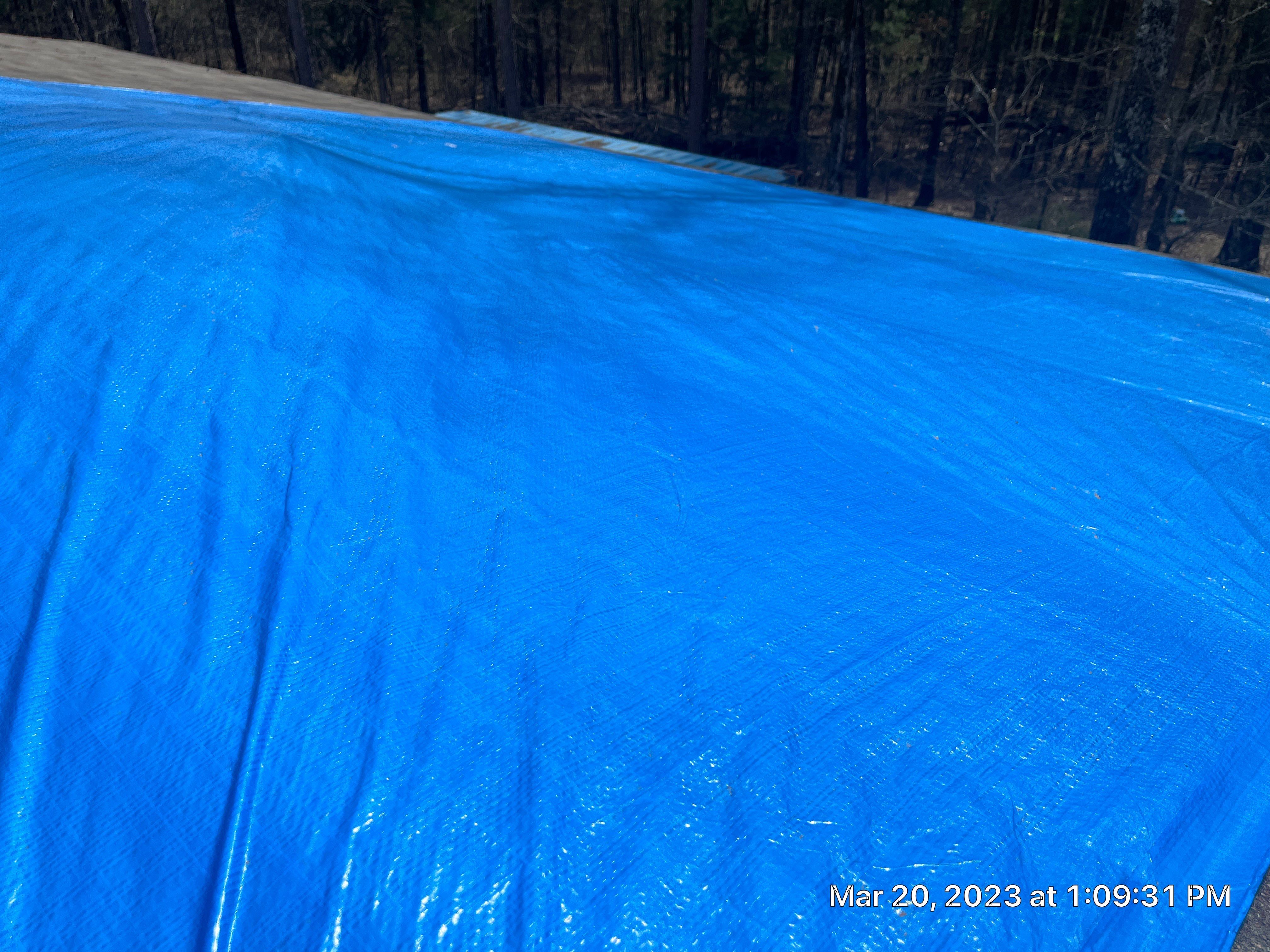 Residential Roofing Installation using 26 Gauge Colored Panels by Hostetler Roofing