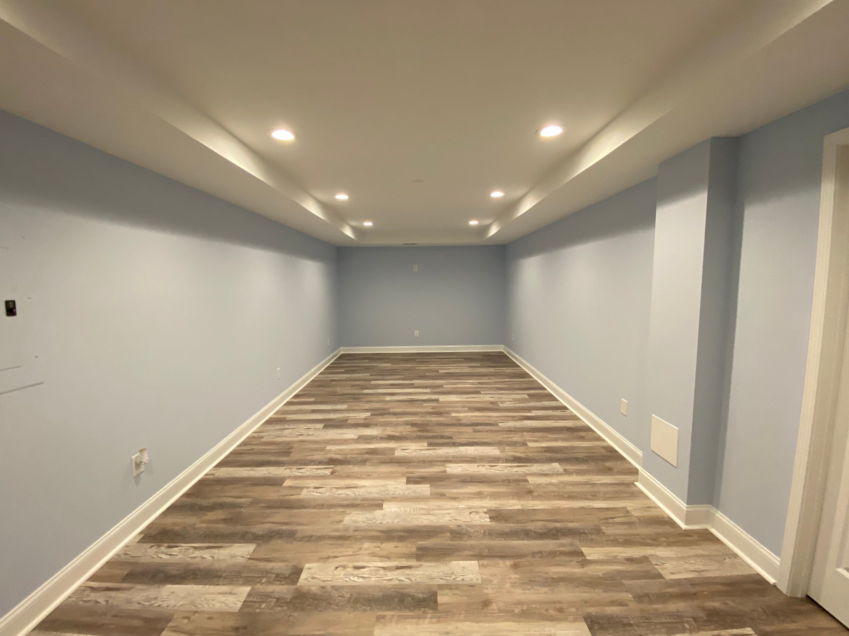 Marietta Basement Remodeling Featuring Custom Wet Bar and Marble Shower by Swift Home Renovations