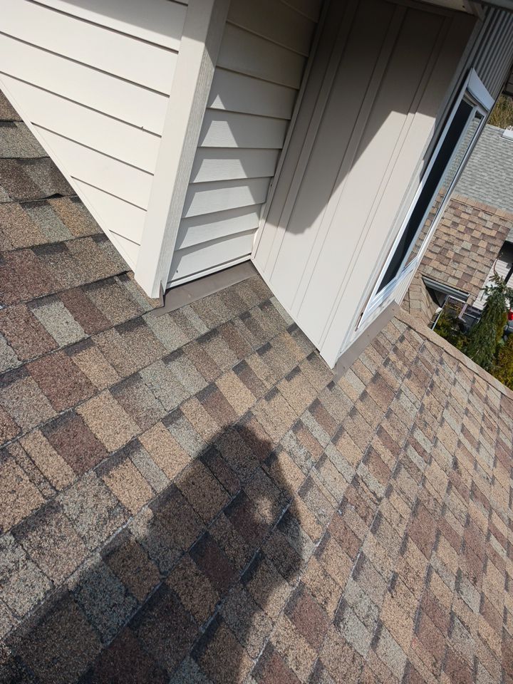 Residential Roofing Installation using OC Oakridge shingles by Top Notch Roofing Inc