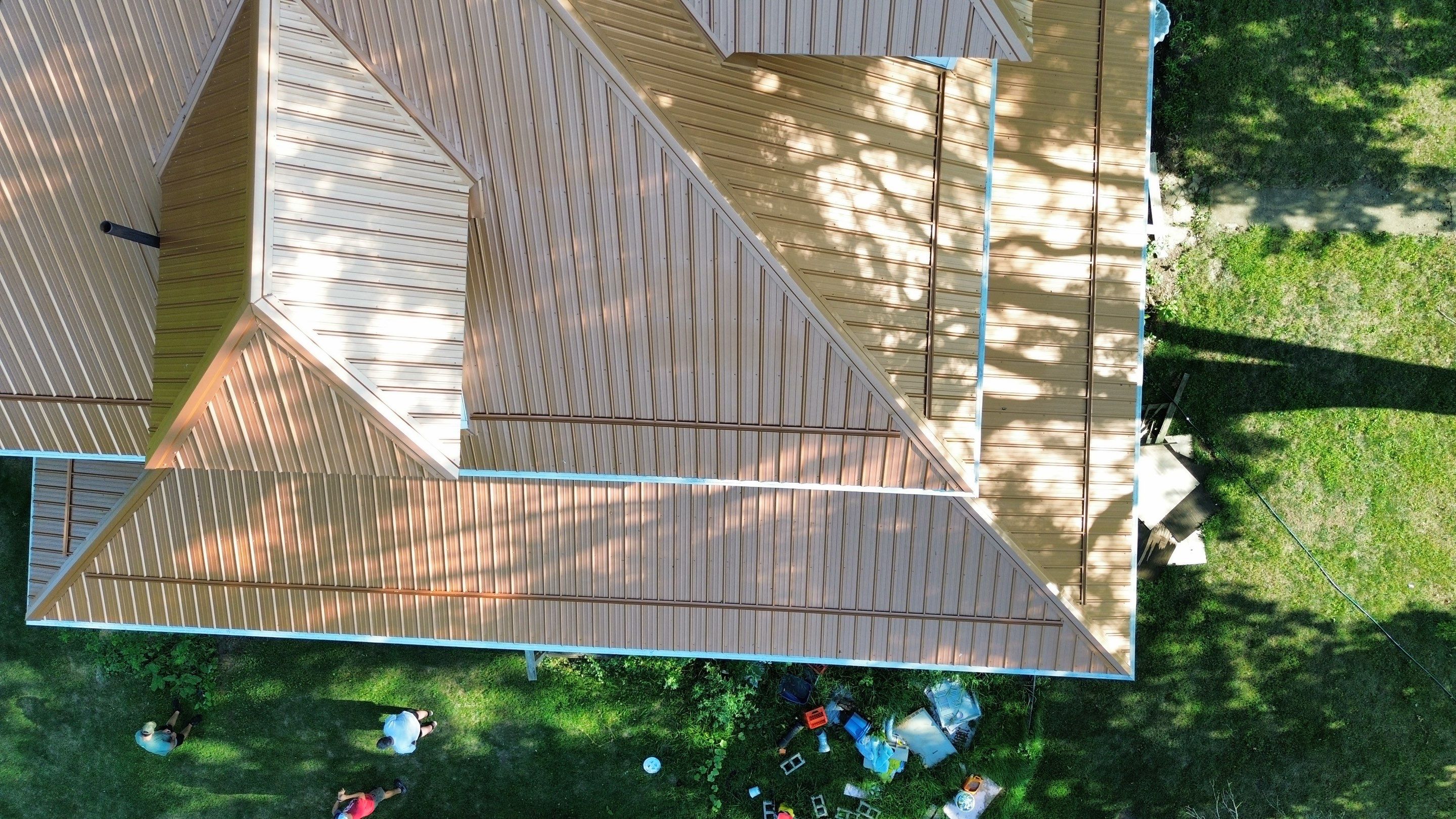 Residential Roofing Installation using Performance Panel Metal - Copper Metallic by RoofX 
