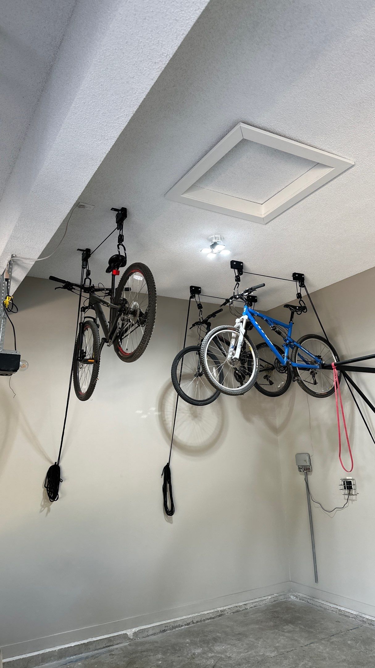 Mark S. chose Global Pine slotwall with his Pewter cabinets.  by Banner Garage