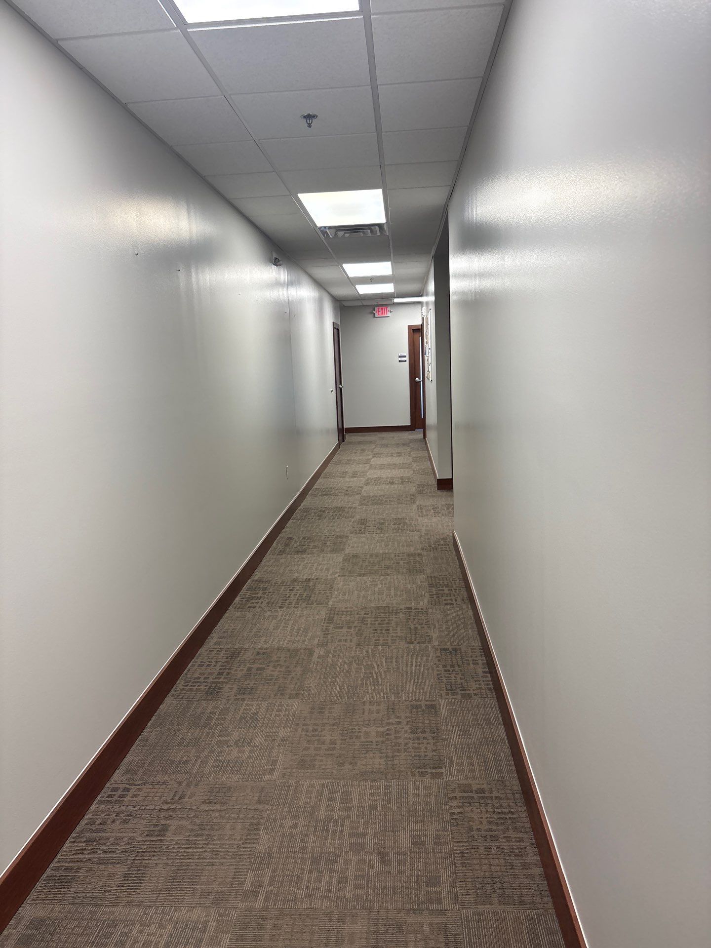 Commercial Office Interior Remodel and Modern Suite Refresh in Sioux Falls by Select Painting, Coatings & Garage Cabinets