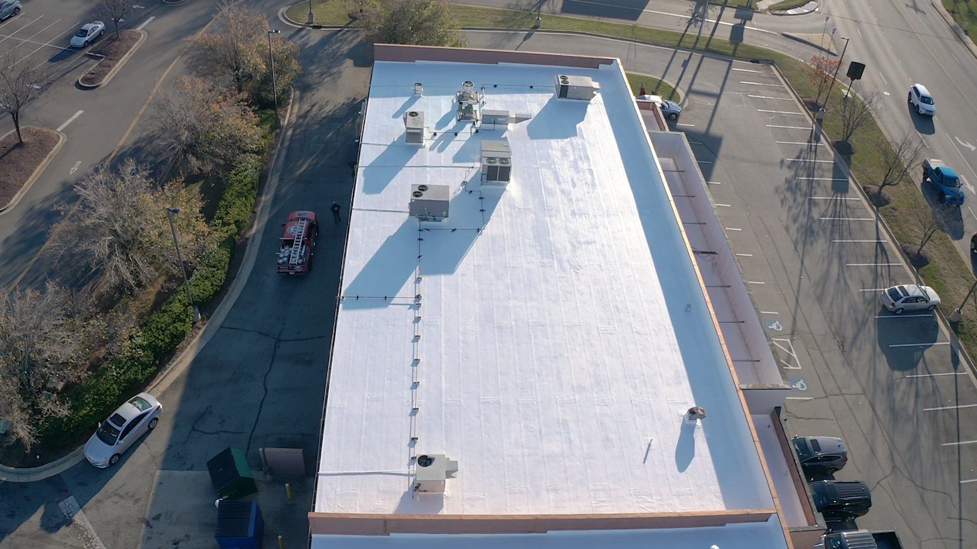 Commercial Coating using Poly Urerthane and Silicone Coating by Just In Time Roofing and Restoration