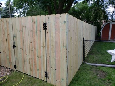 Custom Wood Privacy Fence Installation for Charles City Backyard