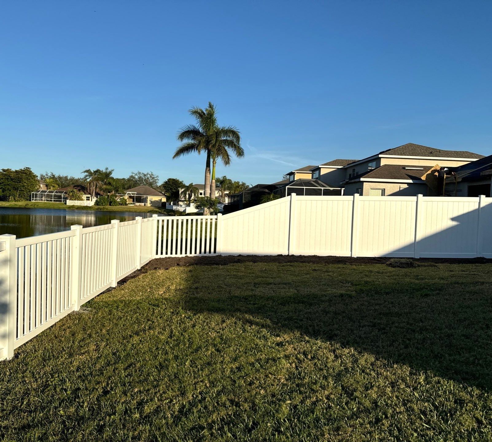 Vinyl Picket Fence Installation using 6Ft White Vinyl Privacy Fence with a 4Ft White Clearwater Picket Fence by Asap fence and gates, LLC