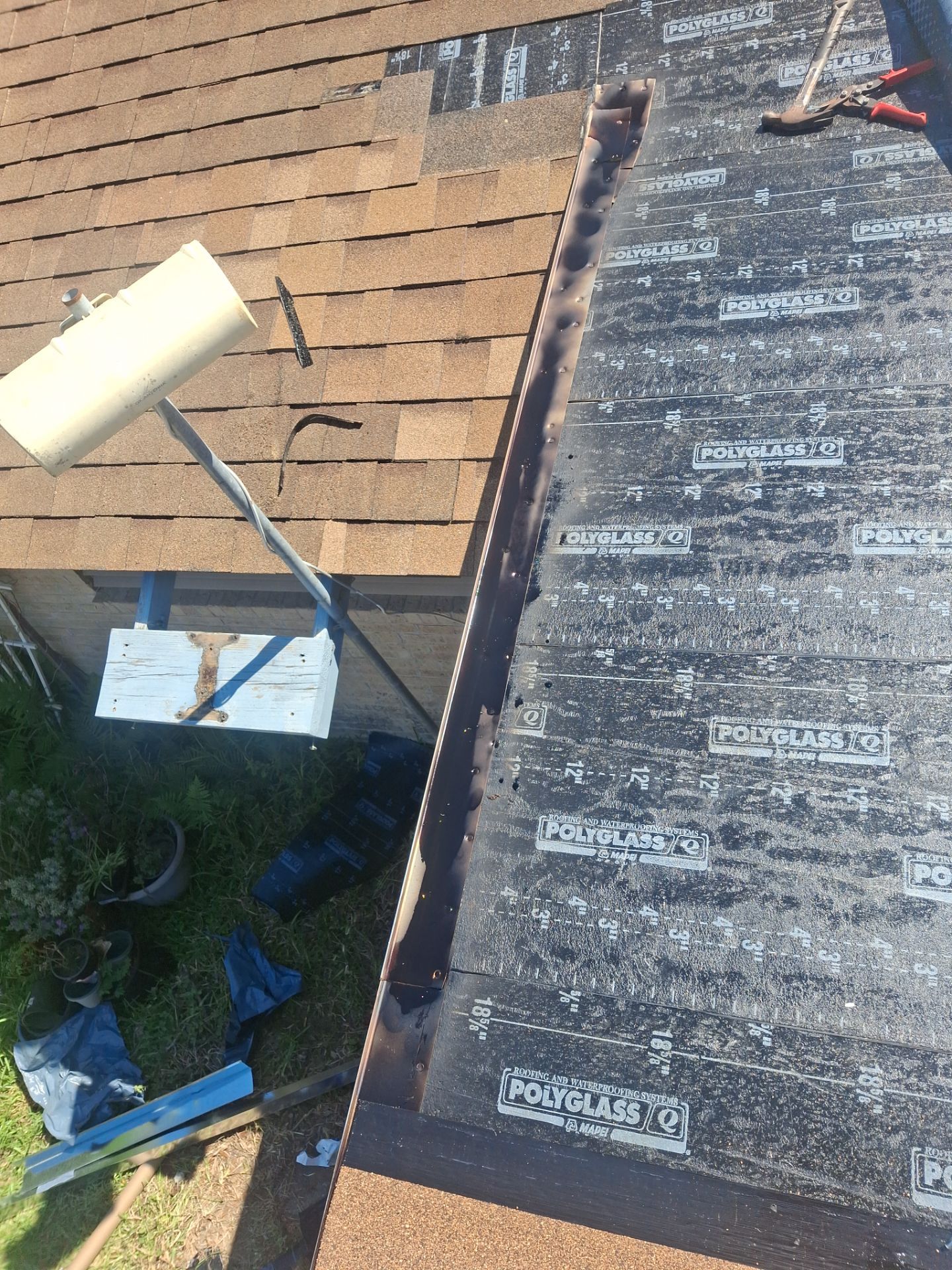 Chimneys need a Cricket.  by Bayfront Roofing and Construction