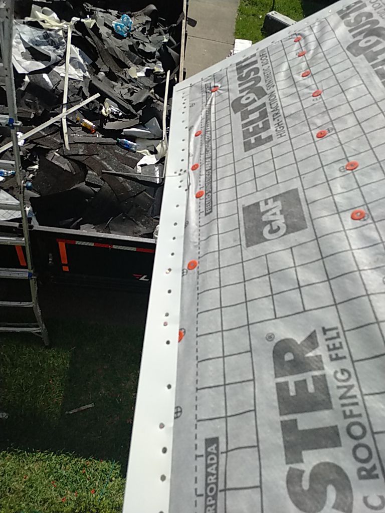 Residential Roofing Installation using Roof Replacement by American Roofing & Construction LLC