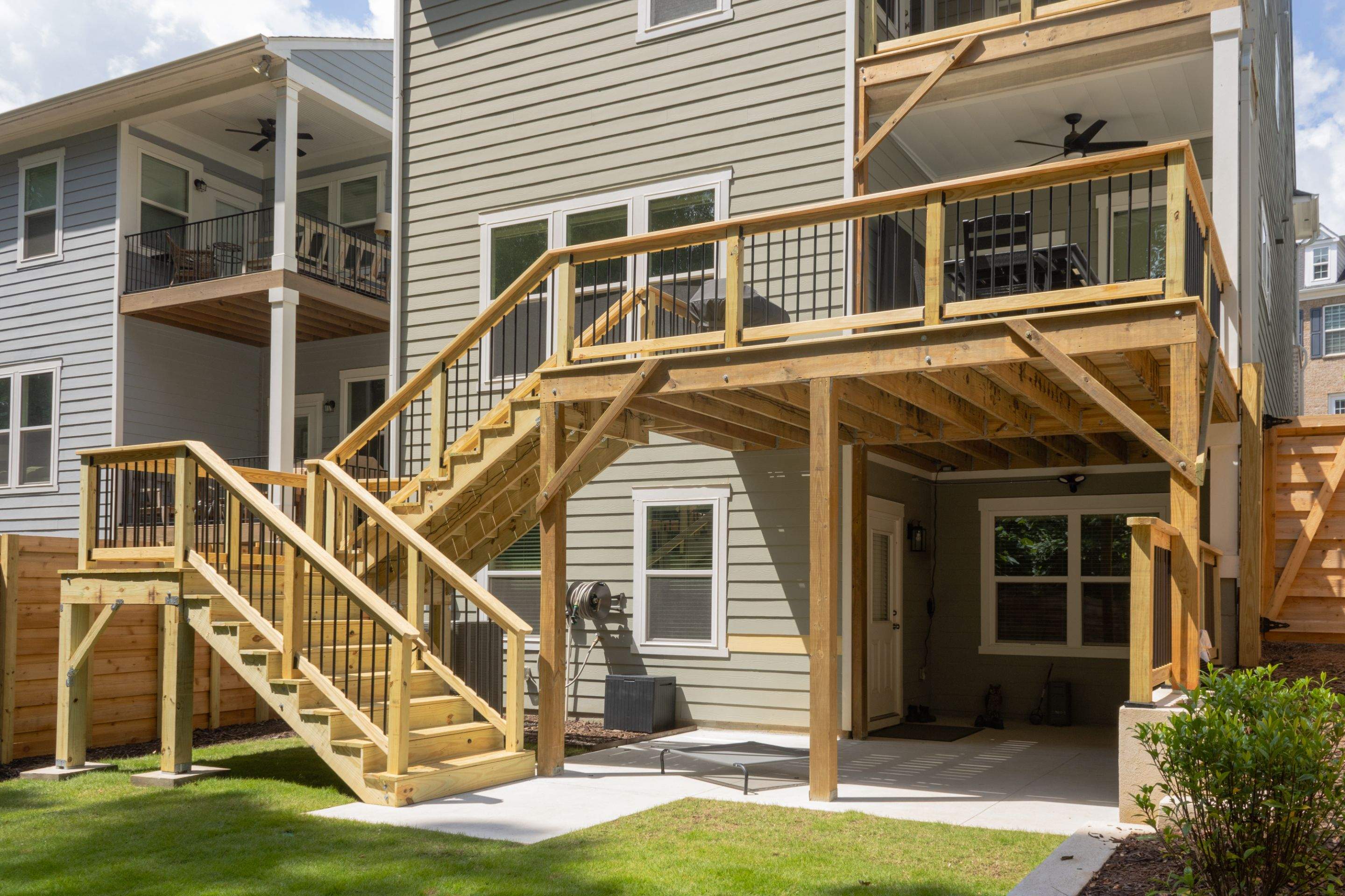 Decatur, GA Multi-Deck Rebuild using Pressure Treated Pine with Trex LED Riser Lights by Nelson Exteriors 