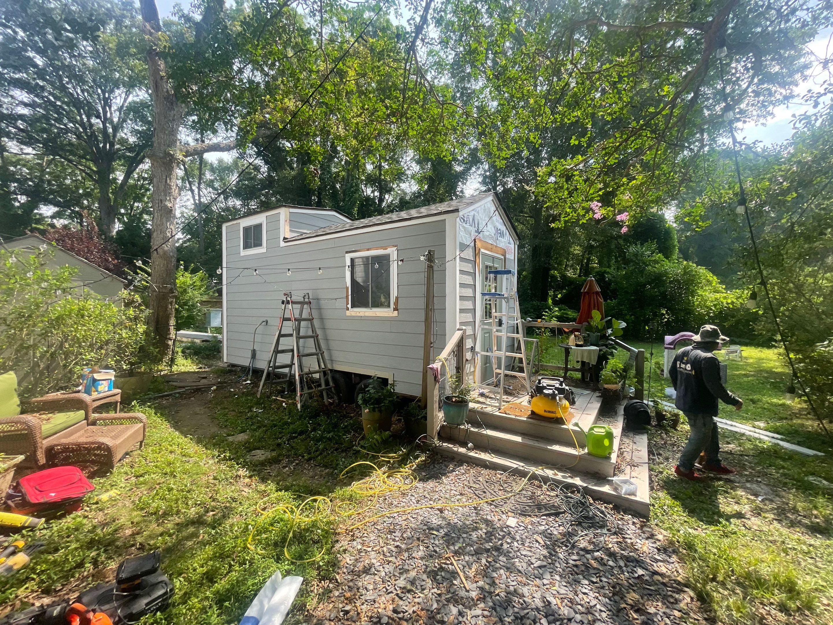 tiny home remodel- siding,paint,roofing by Nailed It Roofing & Remodeling LLC