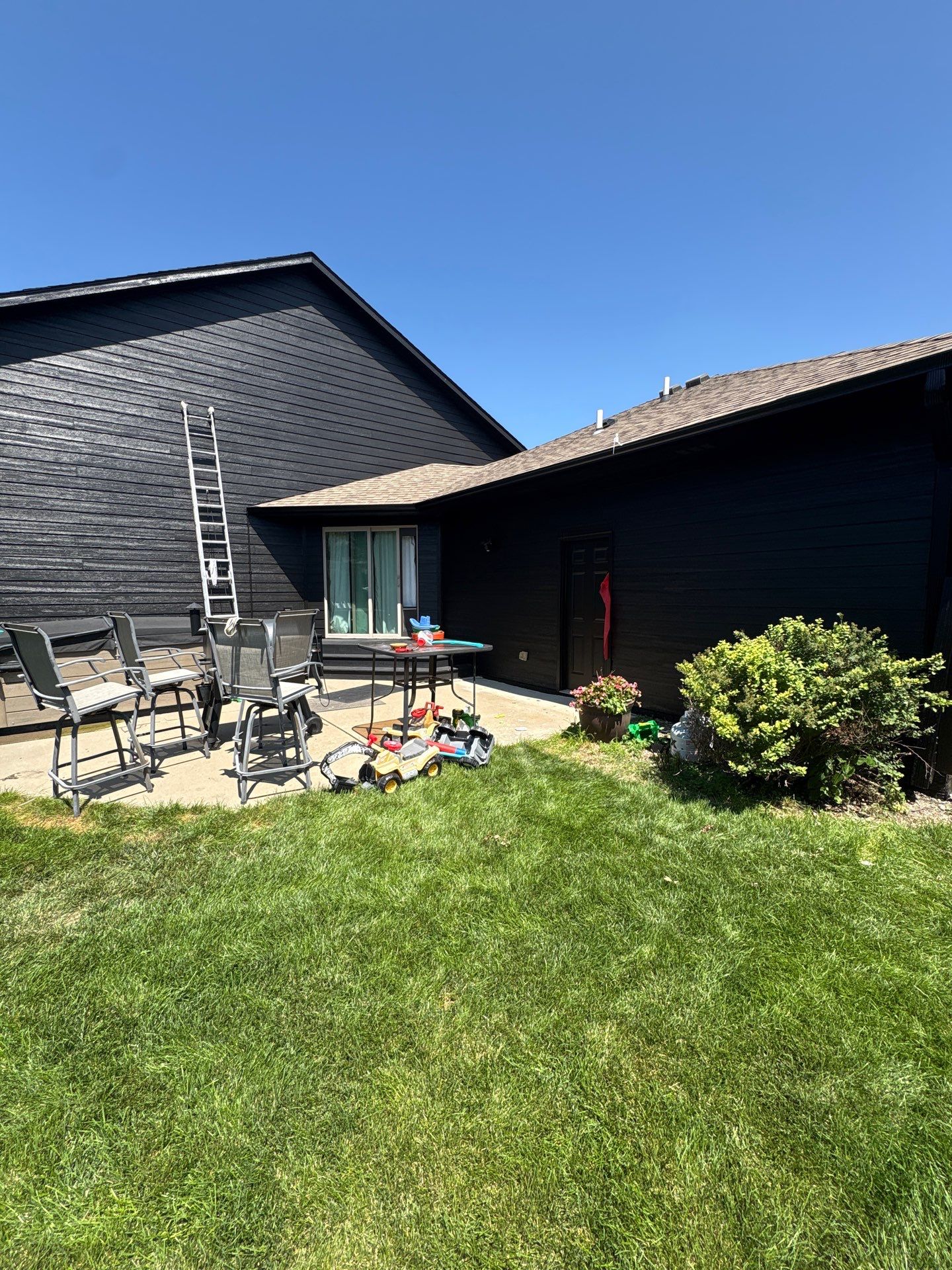 Full Exterior Siding Repaint for Sioux Falls Home and Garage by Select Painting, Coatings & Garage Cabinets