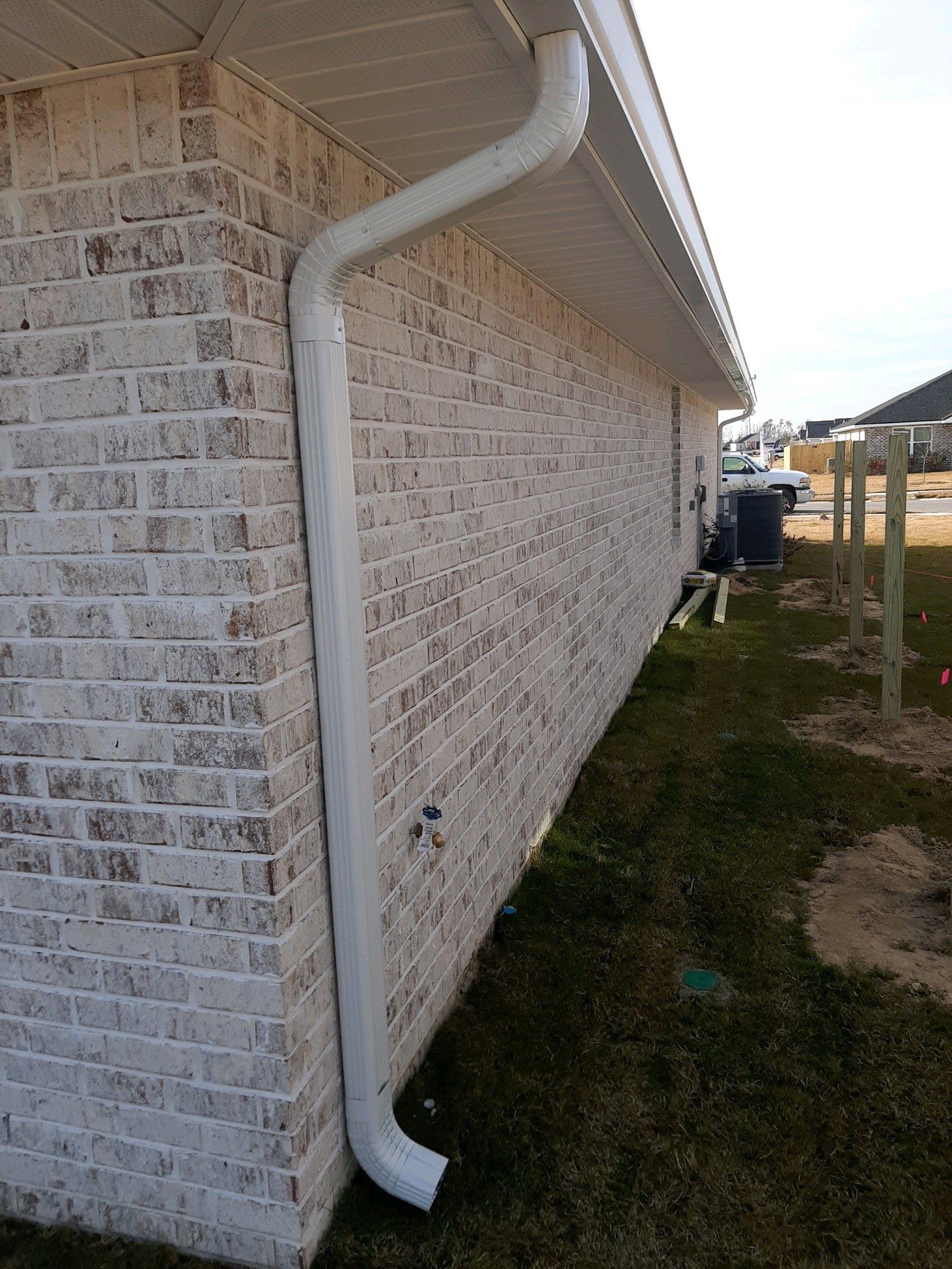 Seamless Gutter Installation Using White K-Style Gutters by Gutter Professors