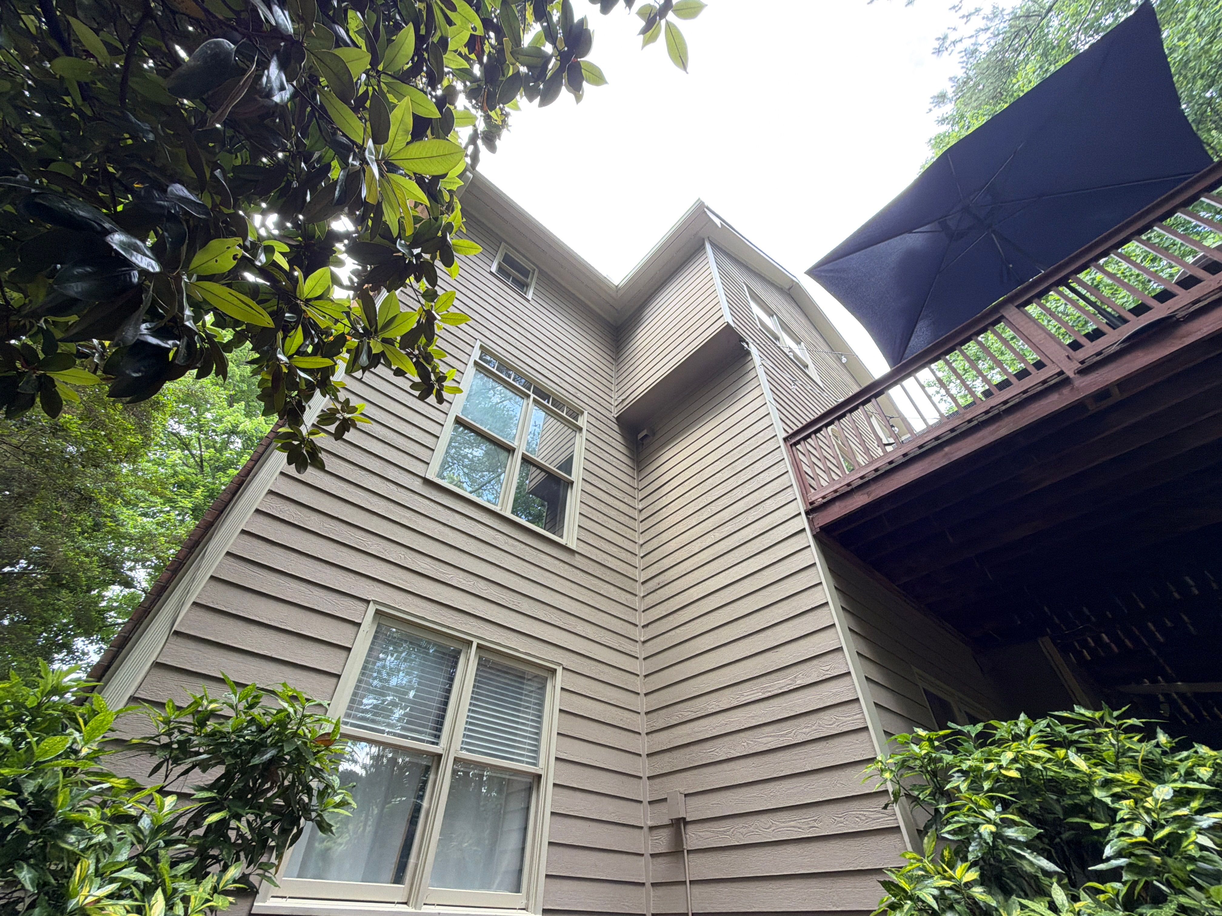 Full James Hardie Siding Replacement and Trex Deck Resurface in the Saddle Color by Nelson Exteriors 
