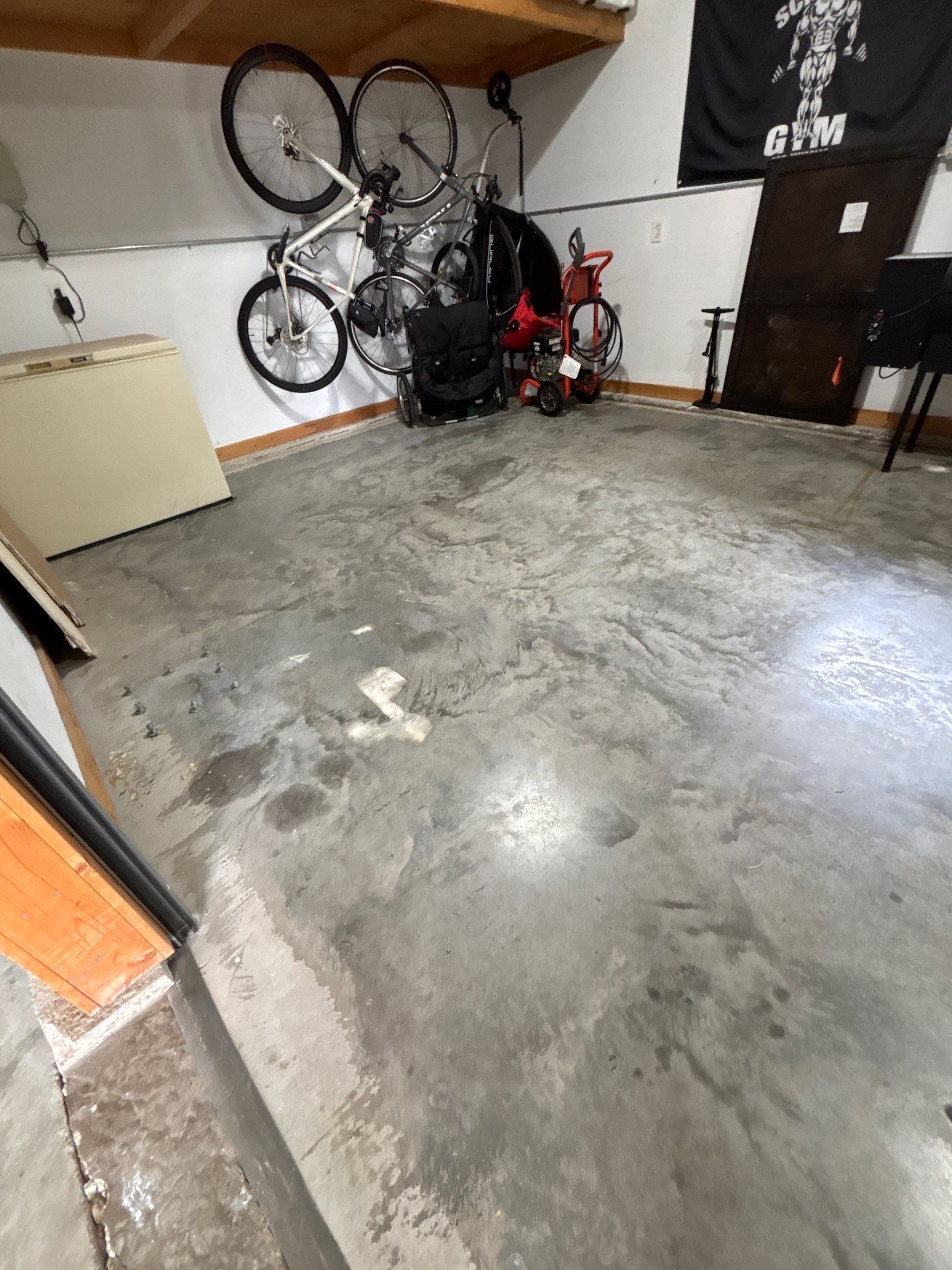 Gray and Black Speckled Polyurea Garage Floor in Dell Rapids by Select Painting, Coatings & Garage Cabinets