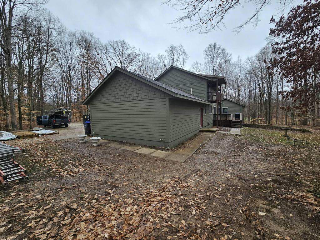 Siding Installation using Primed James Hardie & Straight Edge Shakes by Koontz Construction