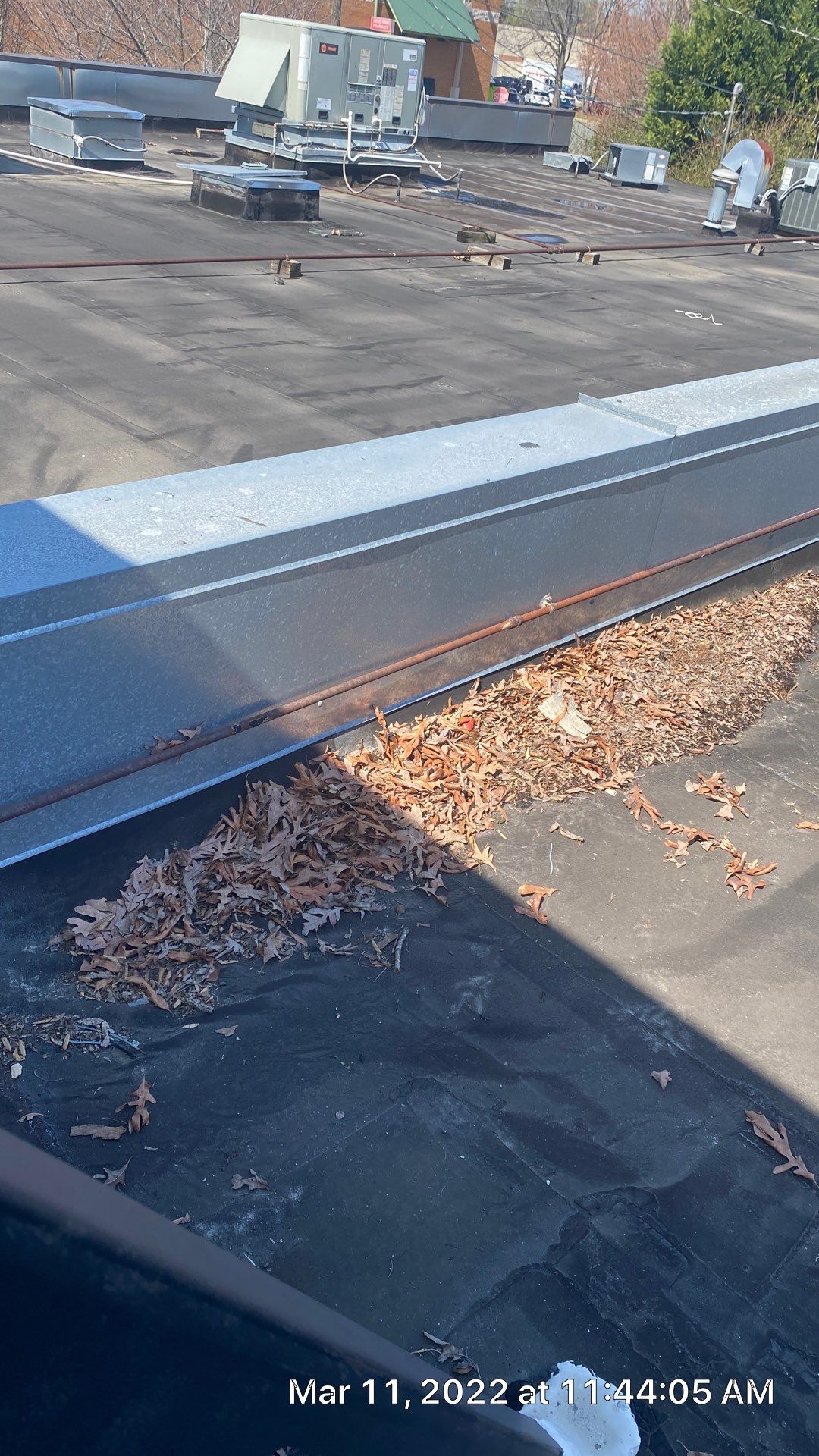 Commercial Roof Coating using Fiberseal basecoat and Silicon Topcoat by Just In Time Roofing and Restoration