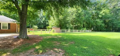 Fence Installation of 3 Rail Ranch with Wire Backing
