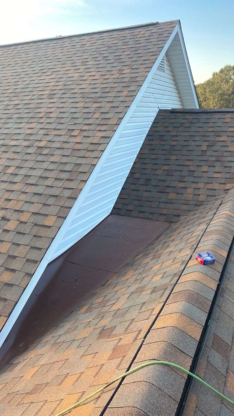 Residential Roofing Installation using Roof Replacement by American Roofing & Construction LLC