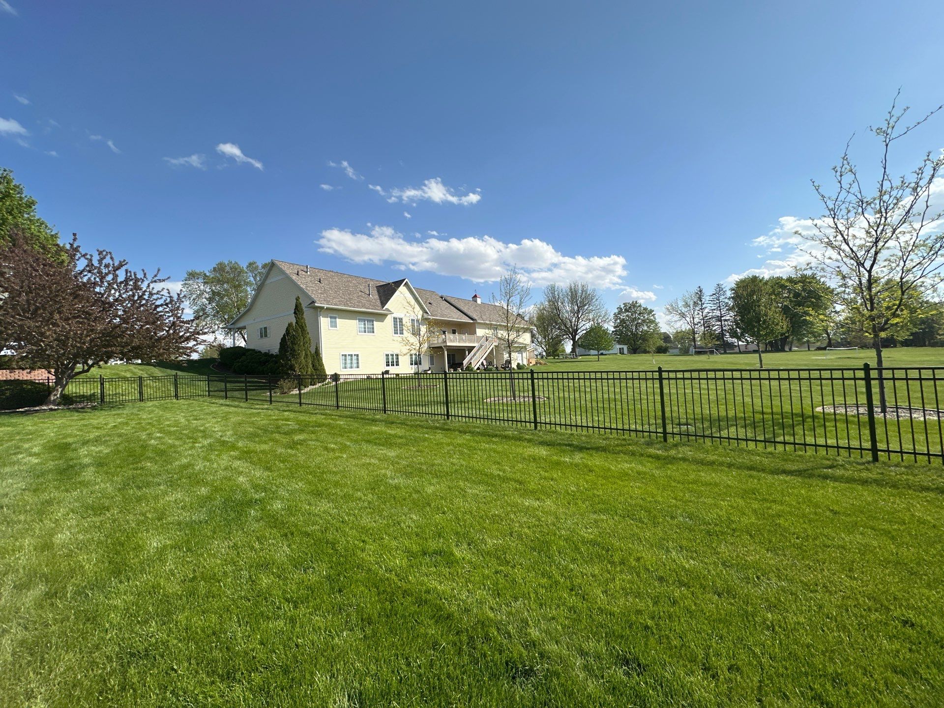 Black Ornamental Metal Picket Fence Installation in Waterloo by Perfect Picket Fence and Stain