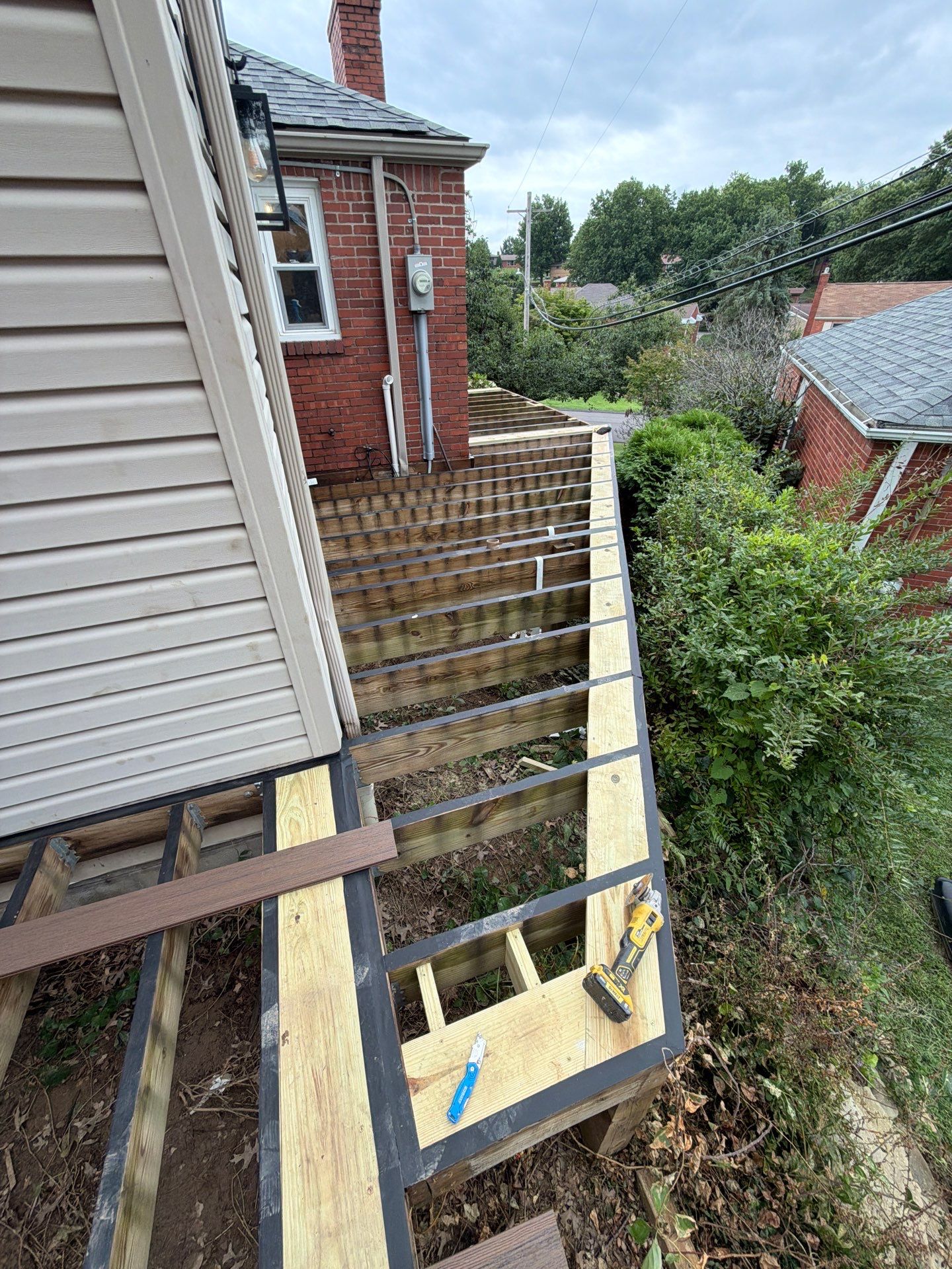 2 tone Composite Re-Deck with Vinyl Railings in Pittsburgh by Cousins Roofing Siding & Decks
