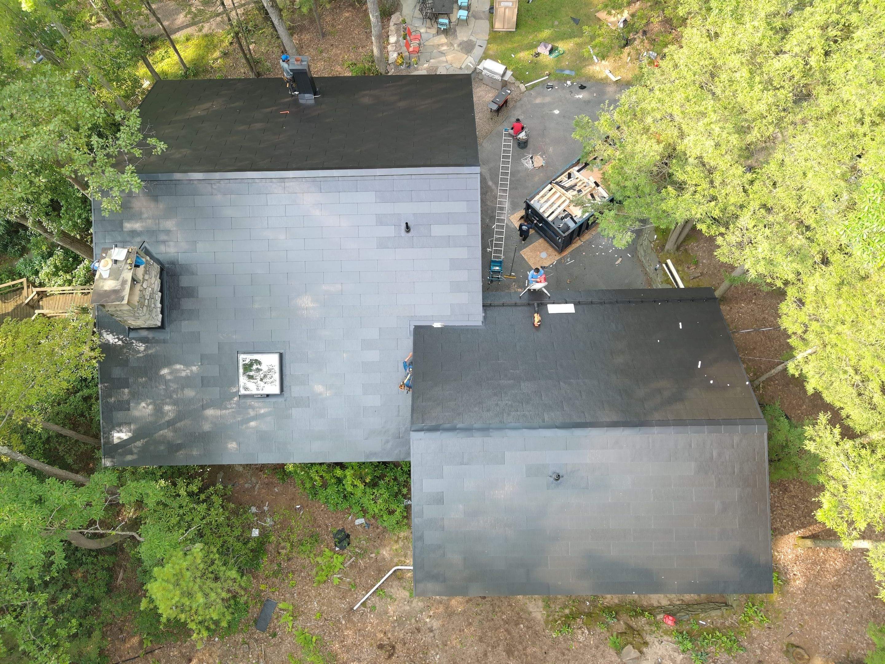 Stunning Tesla Solar Roof Cabin in the Woods by American Home Contractors