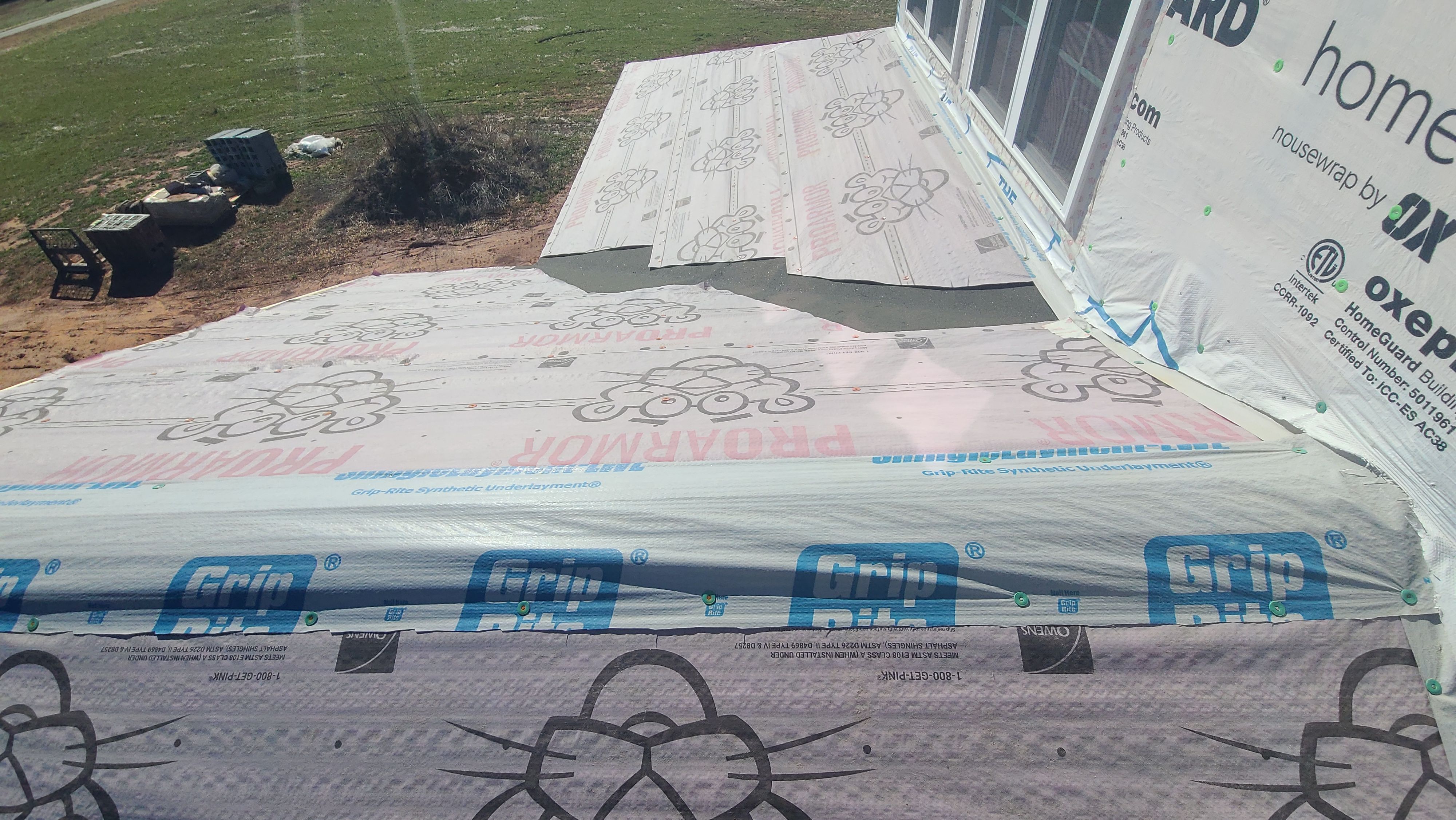 Jason's metal porch roof by BROCK BUILDERS 