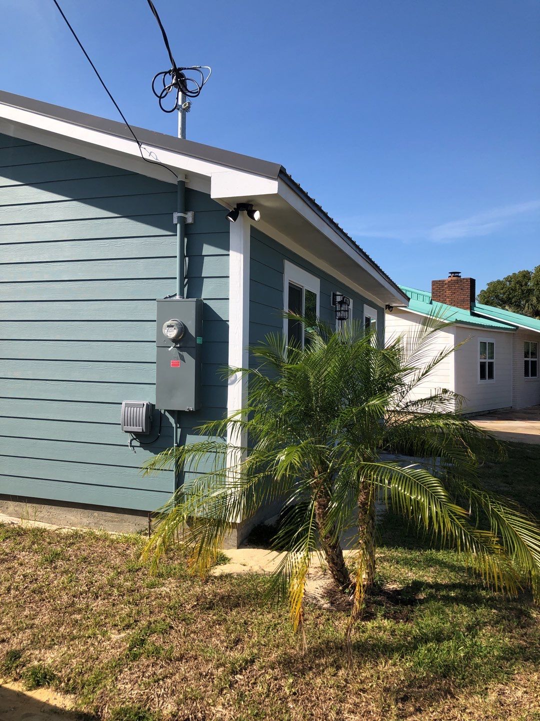 Gutter Installation using K-Style White Seamless Gutters by Gutter Professors