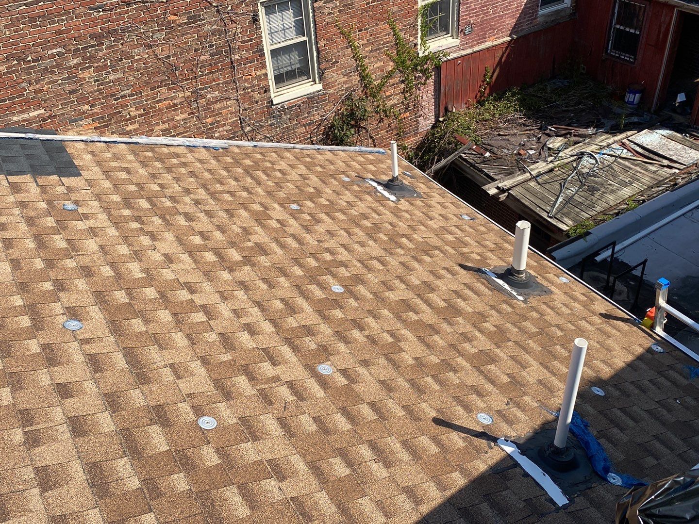 Residential Roofing Installation using Landmark Shingles by Alpha Design Services