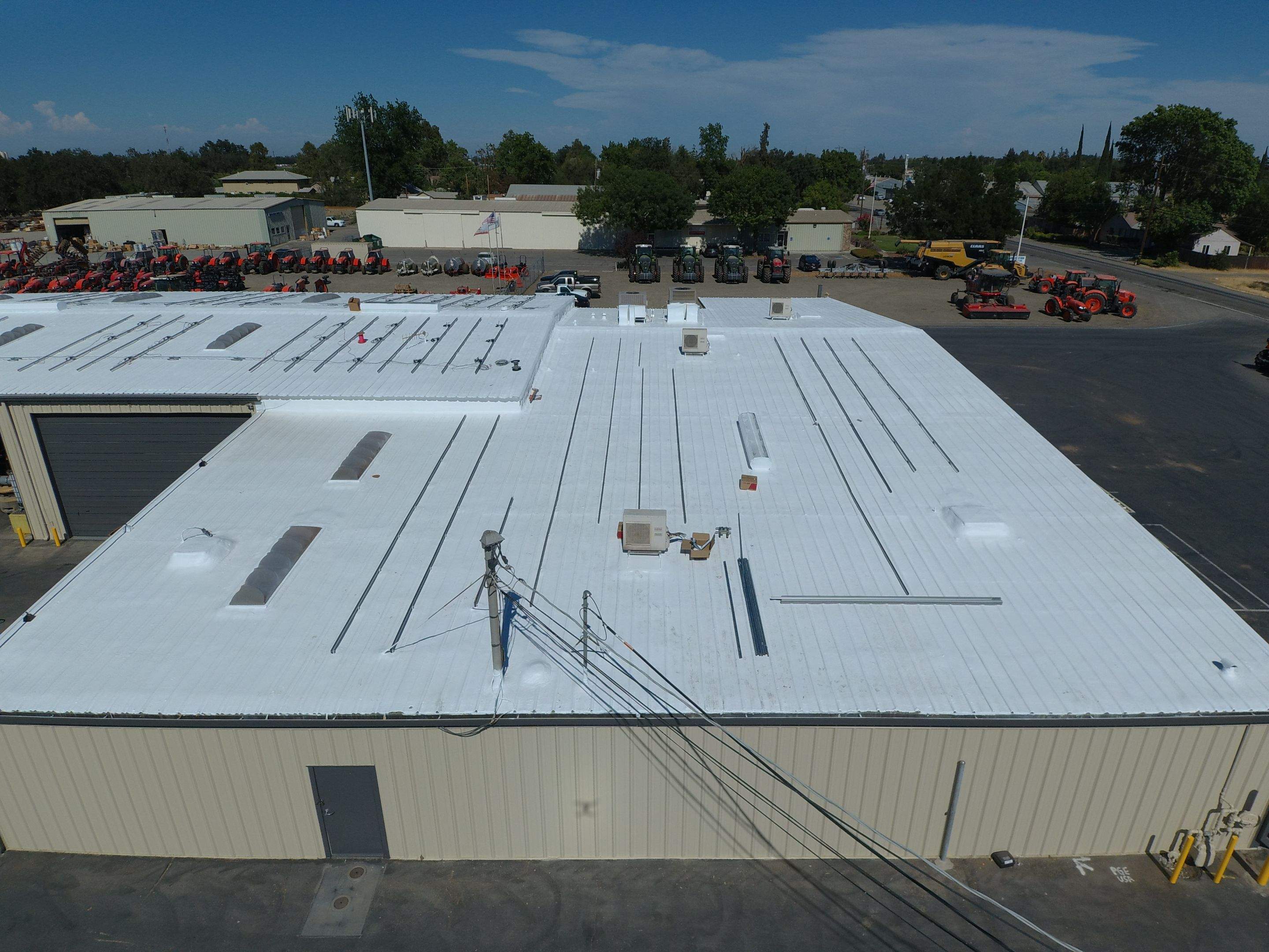 Spray foam and coatings using Conklin Benchmark/PUMA XL coatings and spray foam by Straight Edge Roofing Inc
