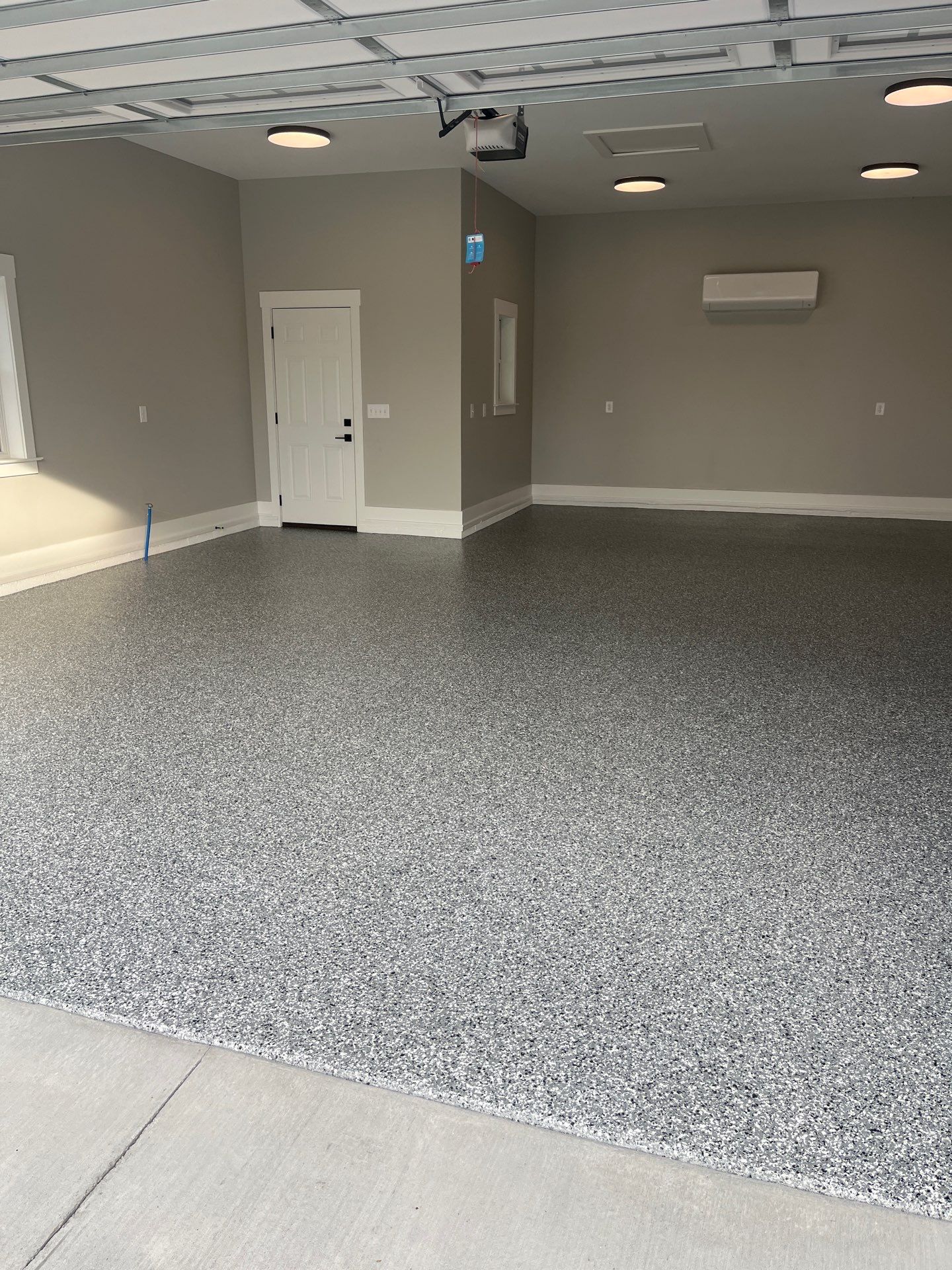 Garage Floor Coating using Wombat by My Garage Floor Guys
