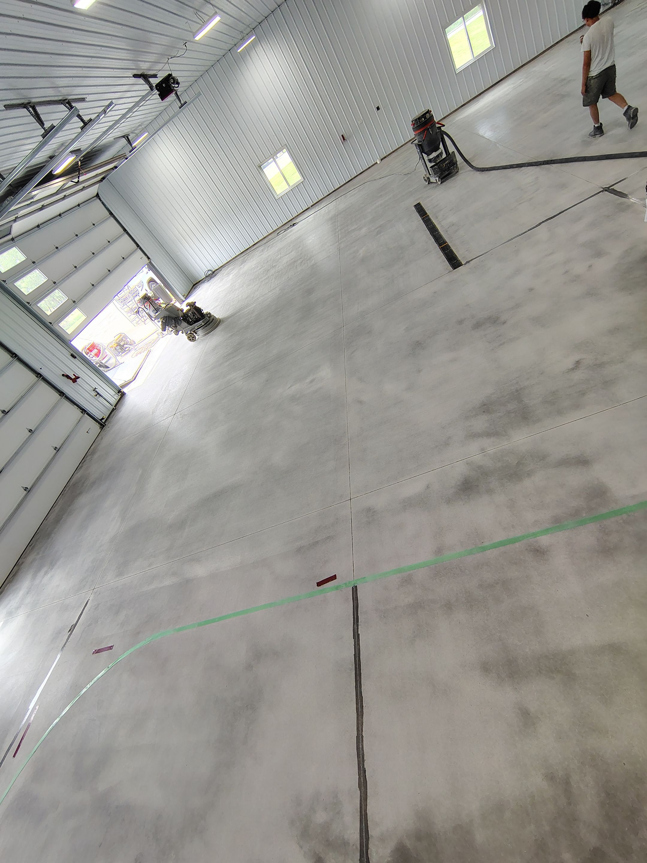 Multi-Stage Concrete Floor Coating for Egan Shop and RV Storage by Select Painting, Coatings & Garage Cabinets