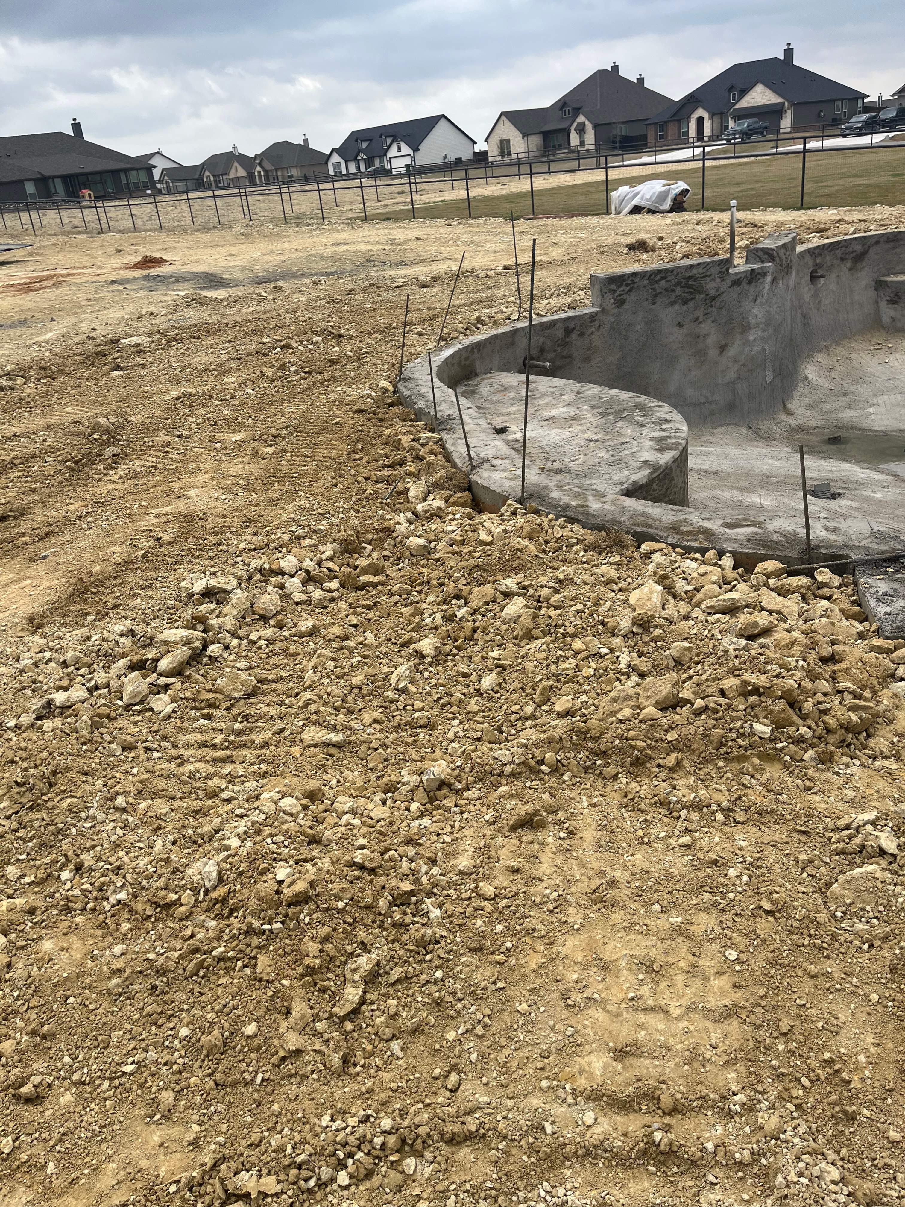 Freeform Pool with Raised Spa and Travertine Decking by Pinnacle Pools and Spas - DFW