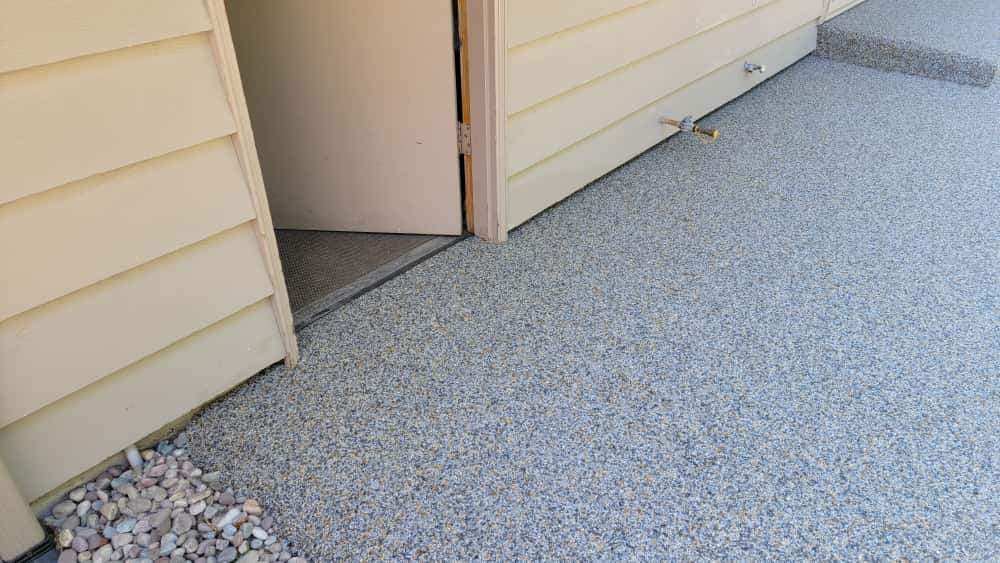 Monticello Sanctuary: A Patio of Refined Tranquility by Concrete Coating Experts Inc.