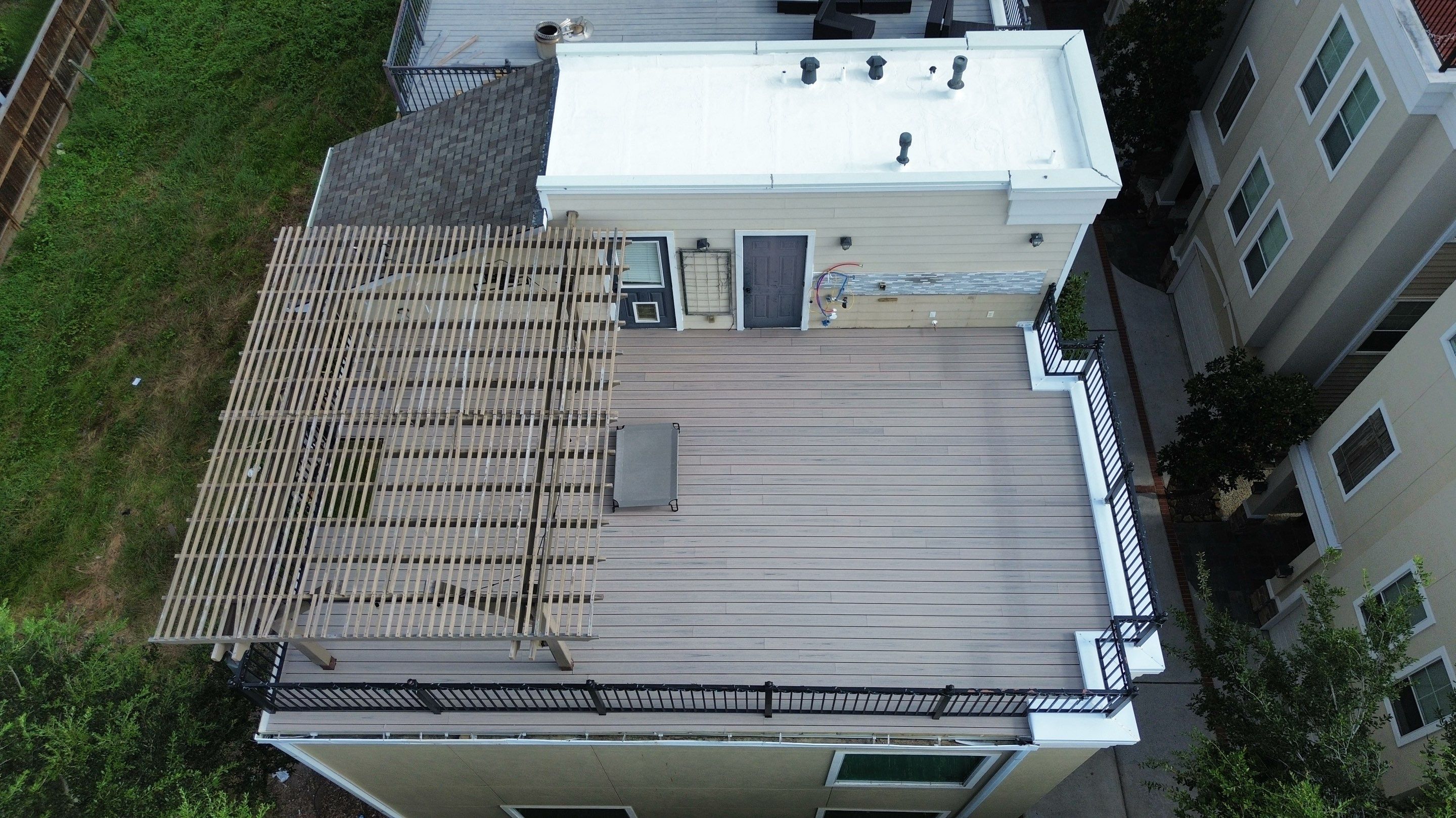 TREX Deck Patio by Houston Roofing & Construction