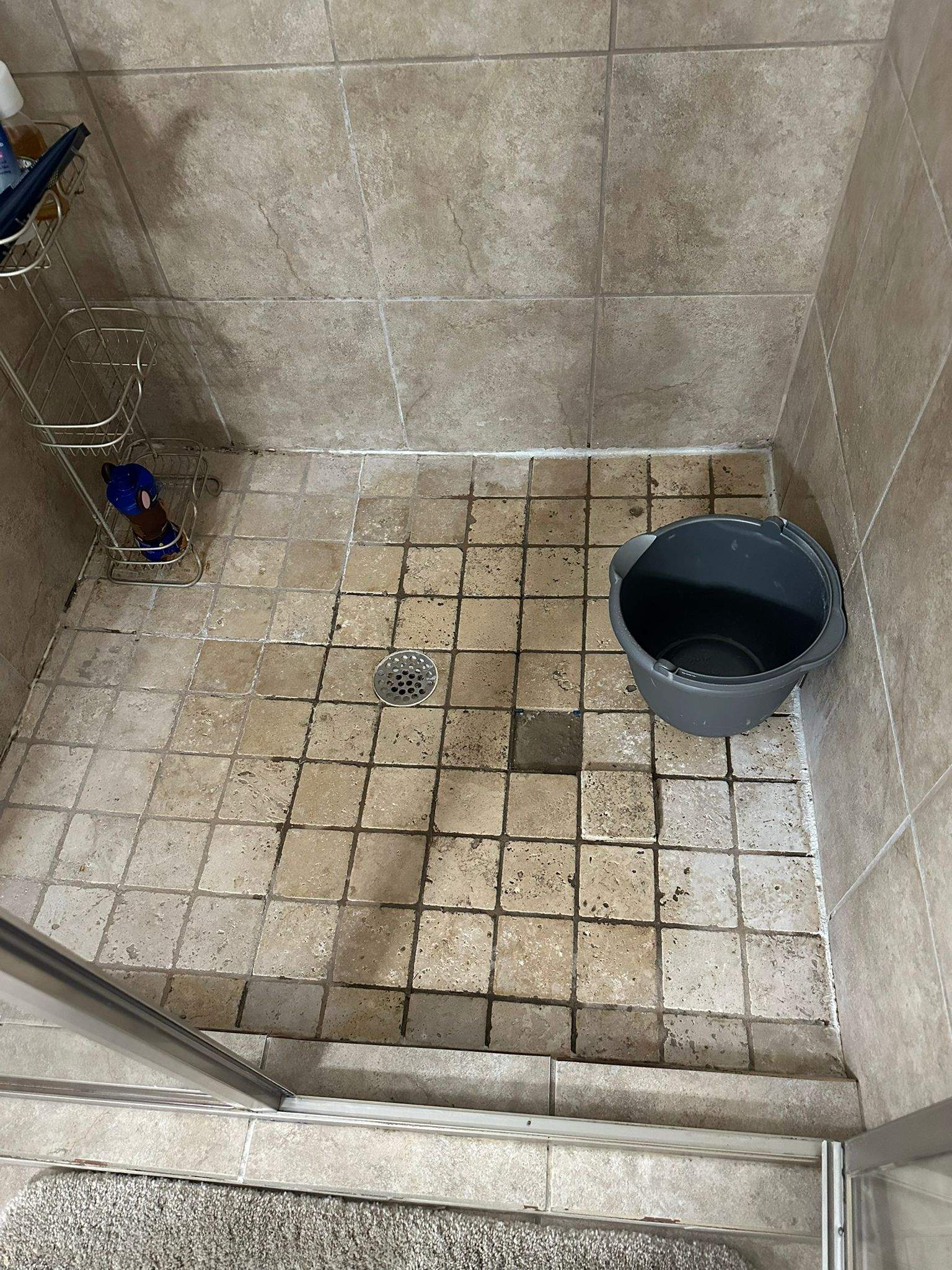 Shower retile and bathroom flooring by Prudencio