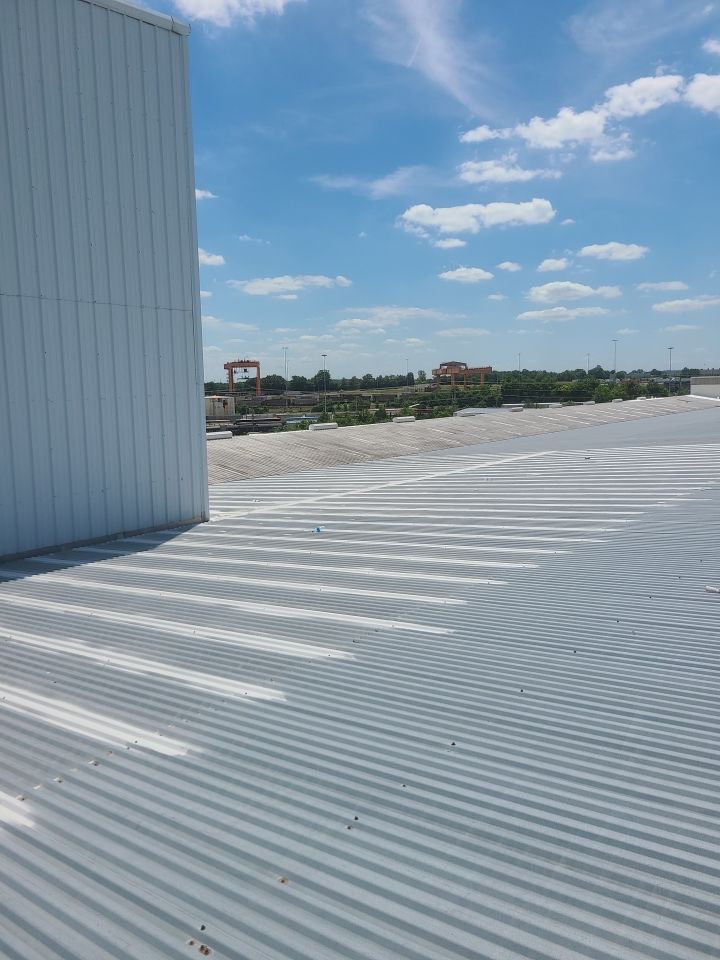 Commercial Metal Restoration System using Aldocoat Coatings by Hostetler Roofing